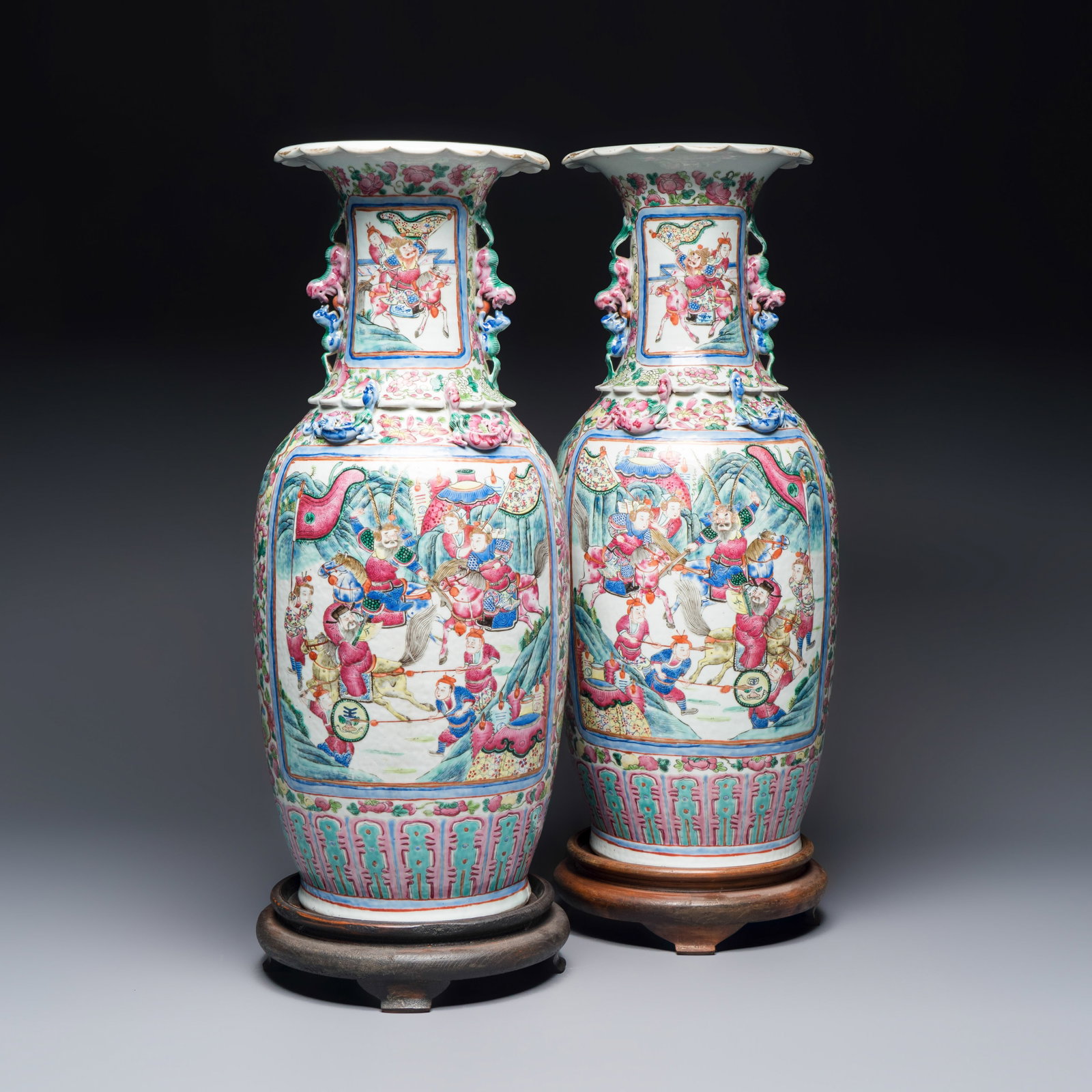 A pair of Chinese famille rose vases with narrative design, 19th C.: A pair of Chinese famille rose vases with narrative design, 19th C. H.: 69,5 cm | incl. stand H.: 63 cm | excl. stand
