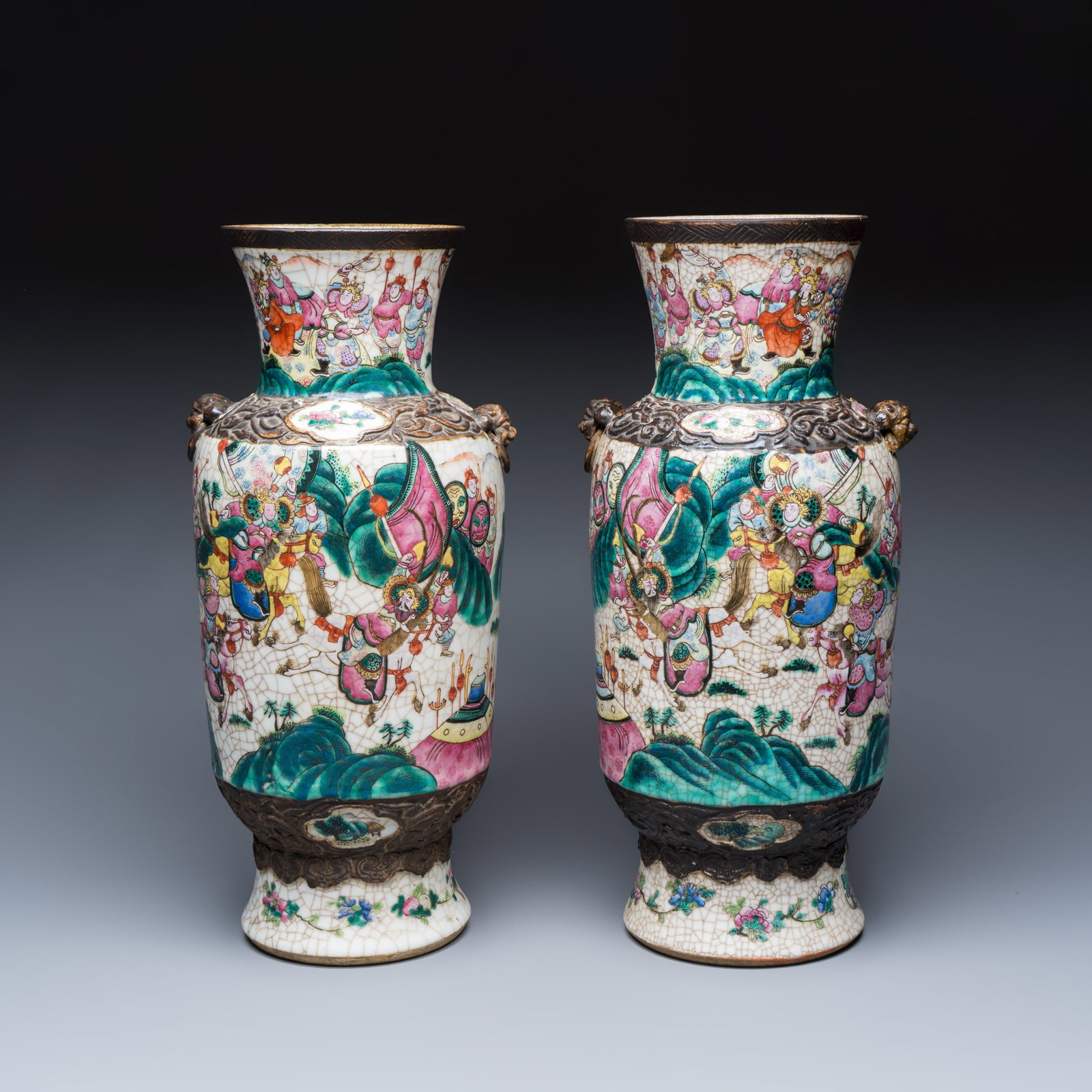 A pair of Chinese Nanking famille rose 'Warriors' vases, 19th C. (1 of 7)