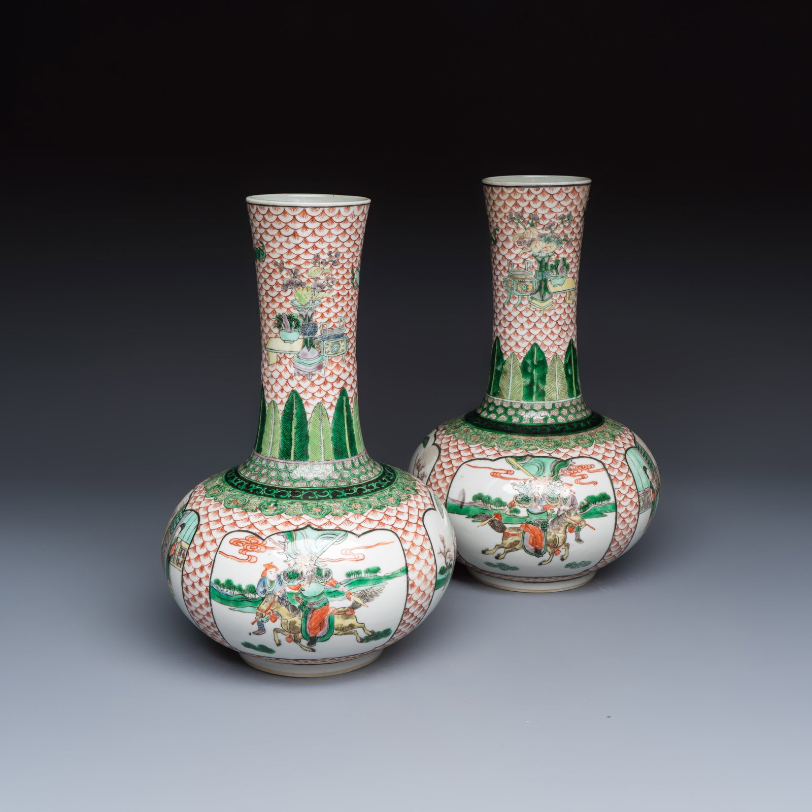 A pair of Chinese famille verte bottle vases with narrative design, 19th C. (1 of 7)