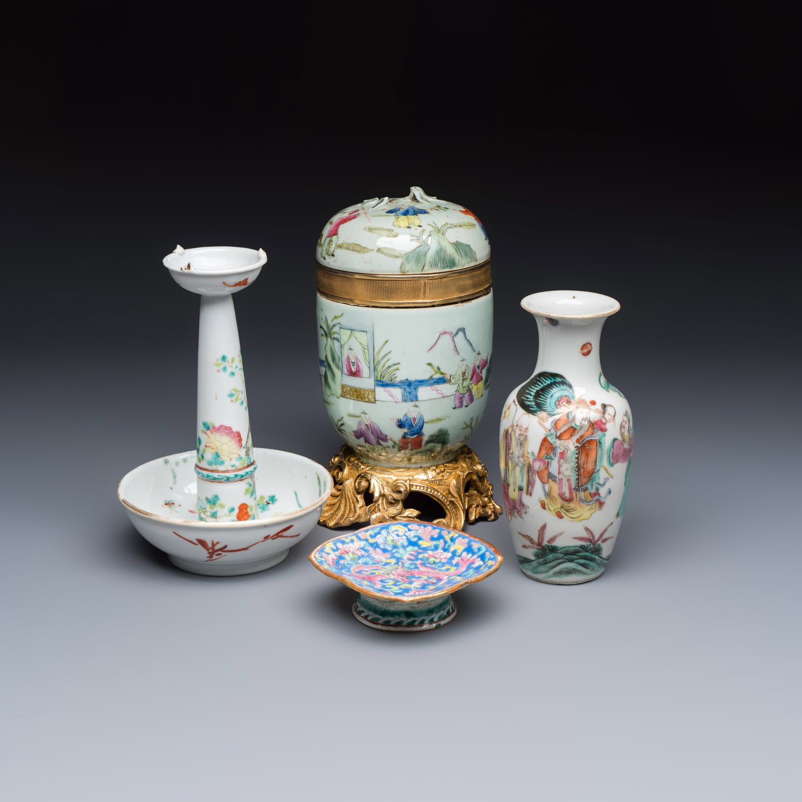Four Chinese famille rose wares, one with gilt-bronze mounts, 19th C.: Four Chinese famille rose wares, one with gilt-bronze mounts, 19th C. H.: 21 cm | the jar, incl. mount and cover Dim: 10 x 10 x 3,3 cm | the tray