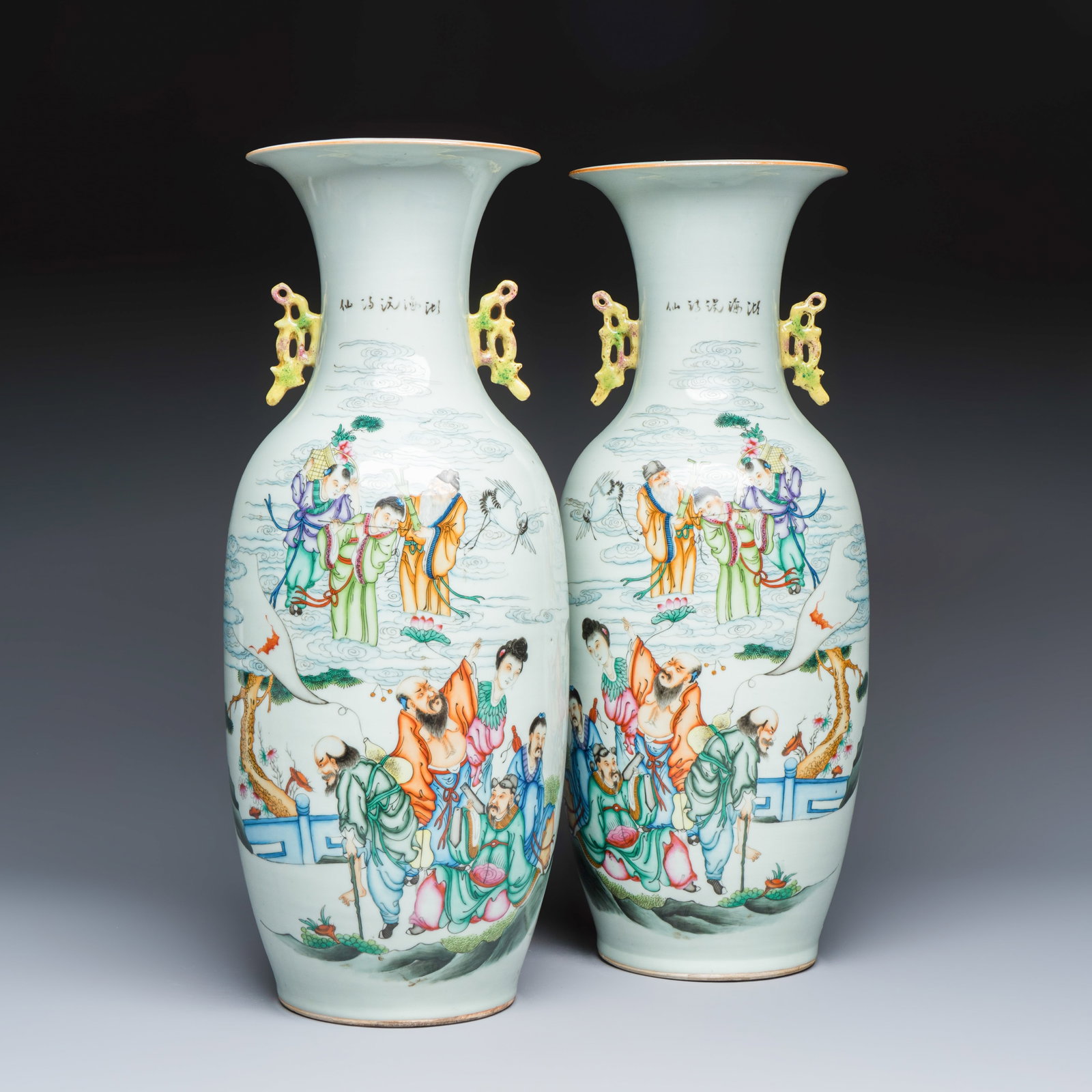 A pair of Chinese famille rose 'Immortals' vases, signed Zhang Heshun' Republic: A pair of Chinese famille rose 'Immortals' vases, signed Zhang Heshun' Republic H.: 58 cm