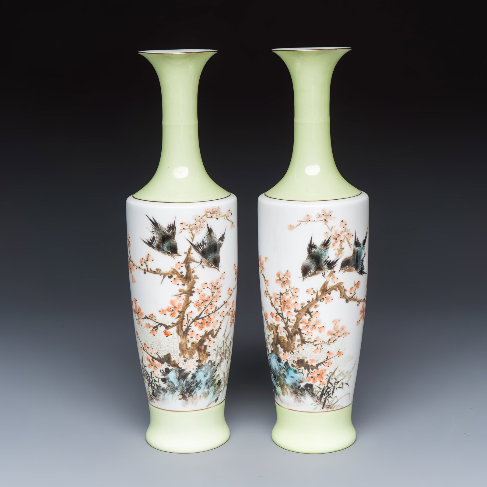 A pair of Chinese polychrome semi-eggshell 'birds among blossoming plum branches' vases, dated 1972: A pair of Chinese polychrome semi-eggshell 'birds among blossoming plum branches' vases, dated 1972 H.: 34,5 cm