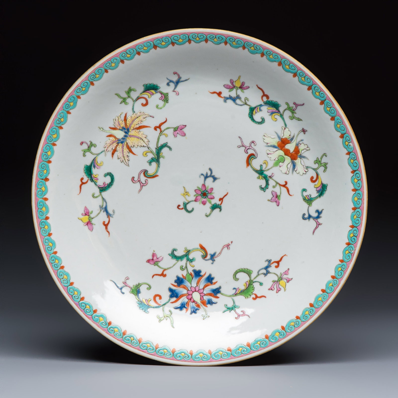 A Chinese famille rose dish with a floral design, Qianlong mark and of the period (1 of 2)