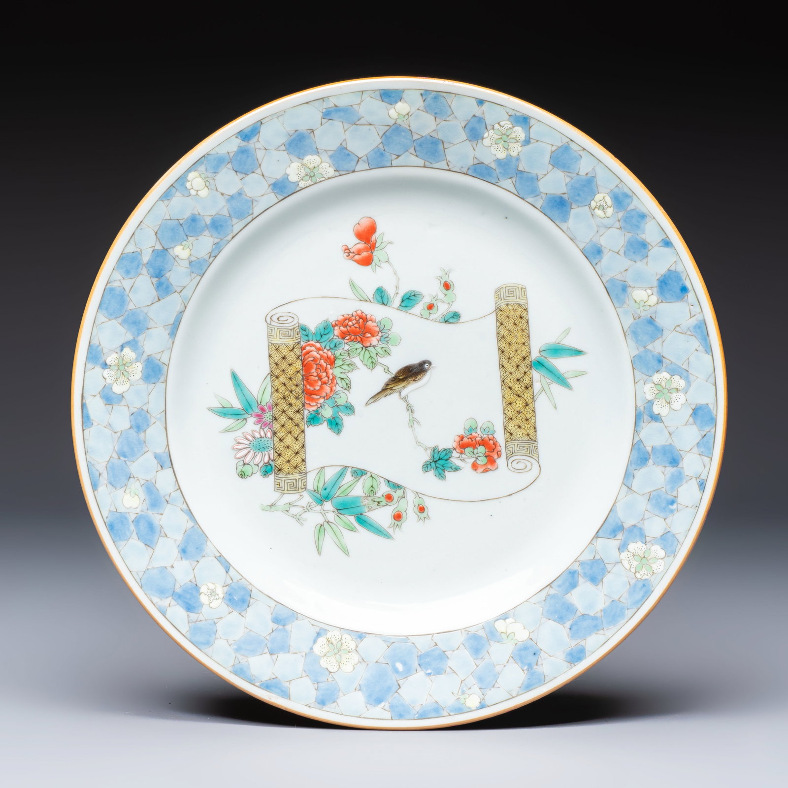 A Chinese famille rose ruby-back plate with a bird on a blossoming branch, Yongzheng (1 of 2)