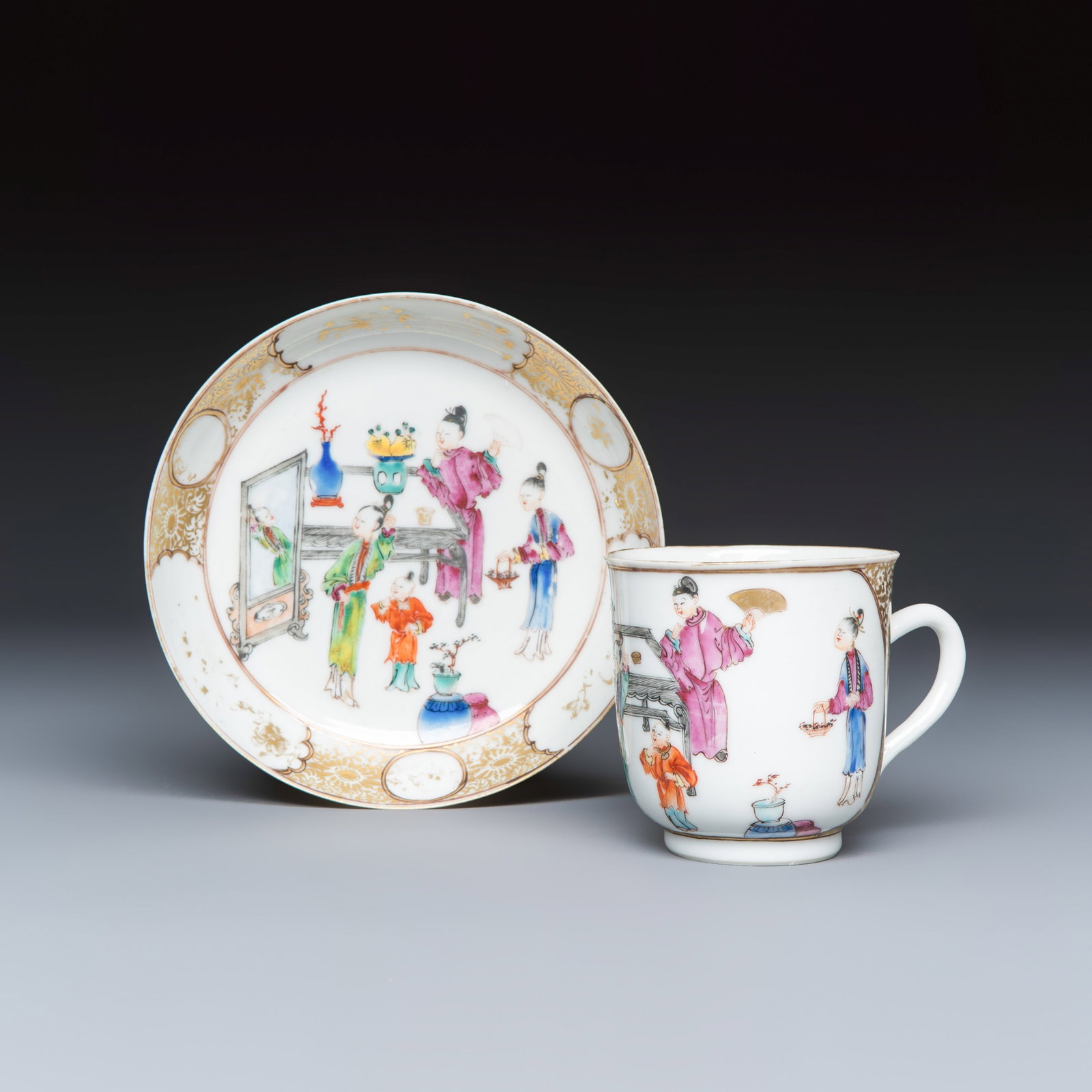 A Chinese famille rose gilt-decorated cup and saucer with figural design, Qianlong (1 of 9)