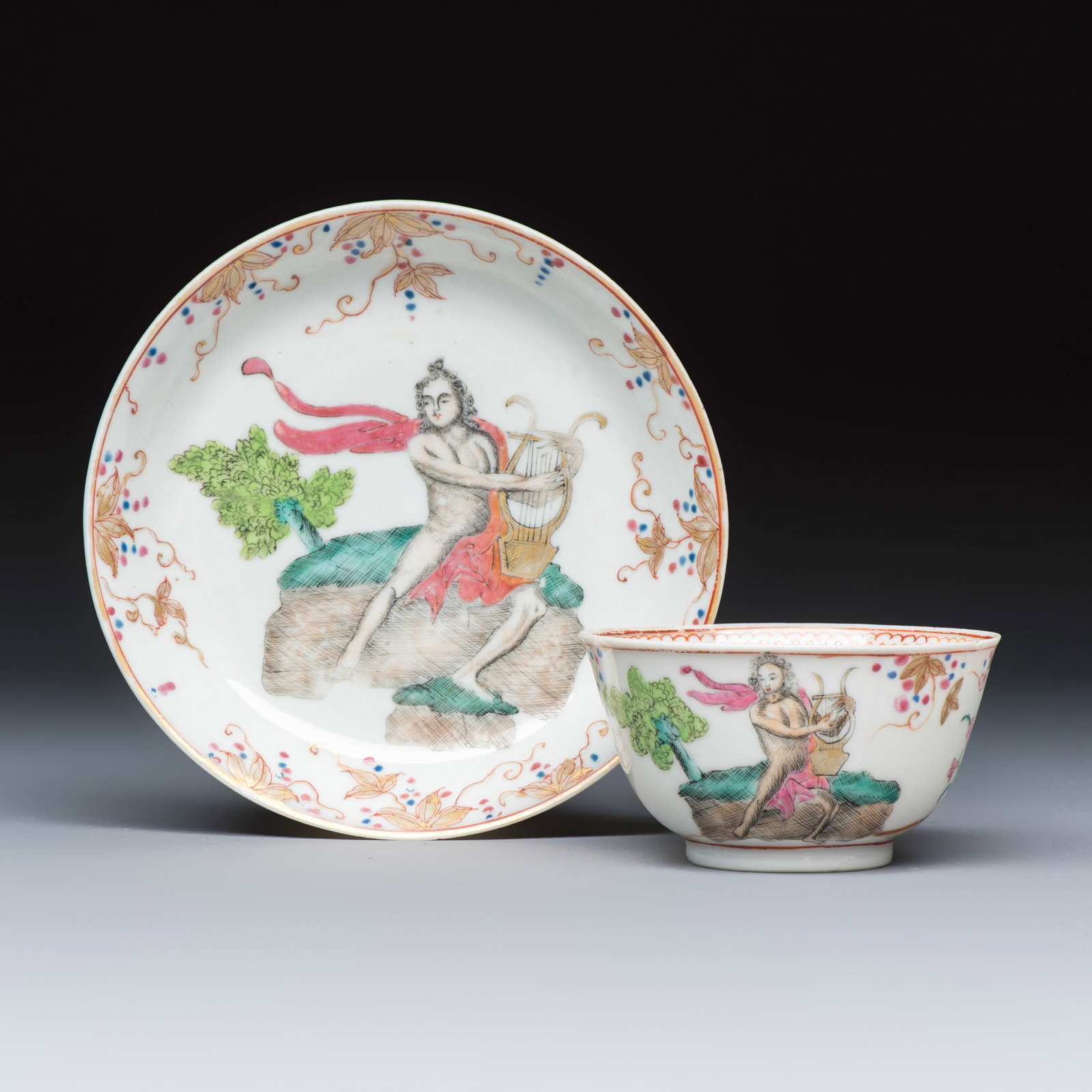 A rare Chinese famille rose export tea bowl and saucer with 'Apollo Playing the Lyre', Qianlong, ca.: A rare Chinese famille rose export tea bowl and saucer with 'Apollo Playing the Lyre', Qianlong, ca. 1750 Dia.: 7,5 cm - H.: 4 cm | the tea bowl Dia.: 12 cm | the saucer Provenance: With a label of Ja