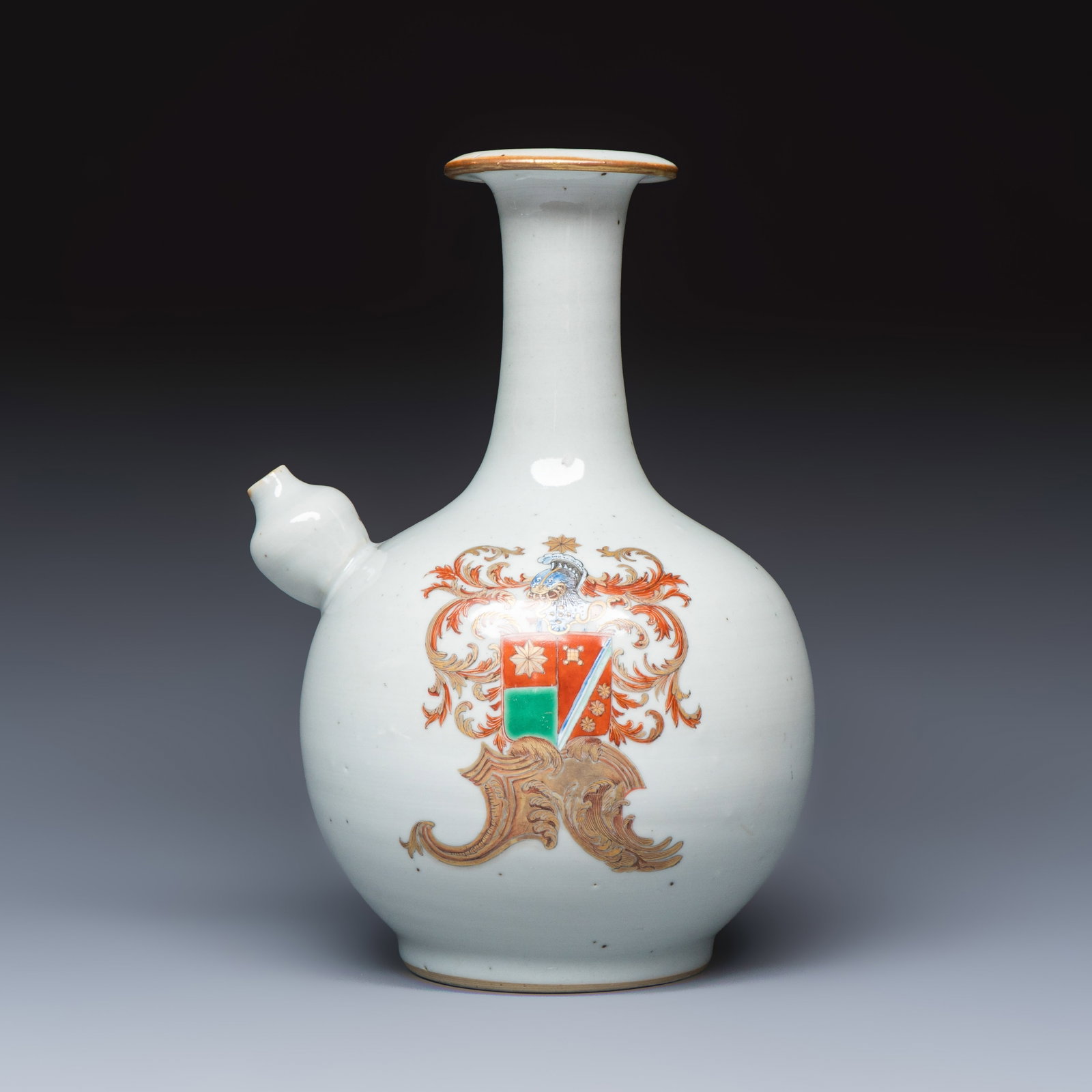 A very rare Chinese famille rose armorial kendi with the arms of De Heere for the Dutch market,: A very rare Chinese famille rose armorial kendi with the arms of De Heere for the Dutch market, Qianlong L.: 16,9 cm - H.: 24,2 cm The arms are of the De Heere family of Middelburg and Dordrecht. The 