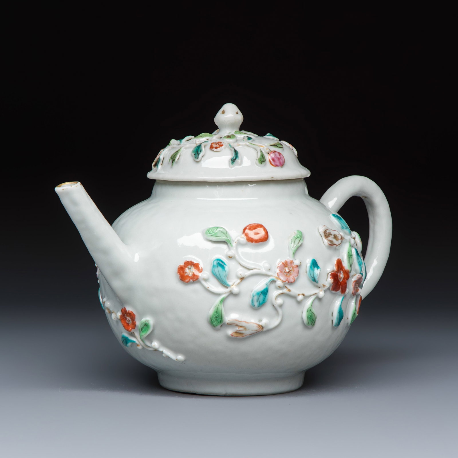 A Chinese famille rose relief-decorated teapot with floral design, Yongzheng (1 of 7)