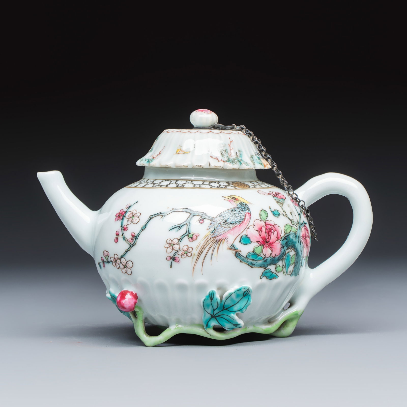A Chinese famille rose 'Pheasant among Flowering Branches' teapot and cover with relief design, (1 of 7)