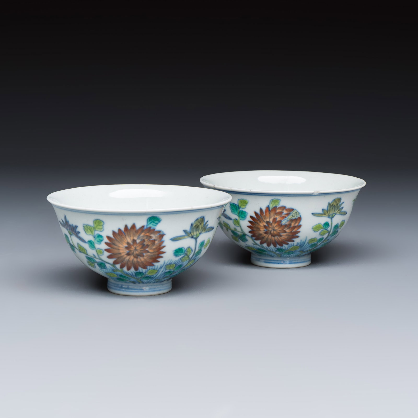 A pair of Chinese doucai bowls with floral design, Jiaqing mark and of the period (1 of 7)