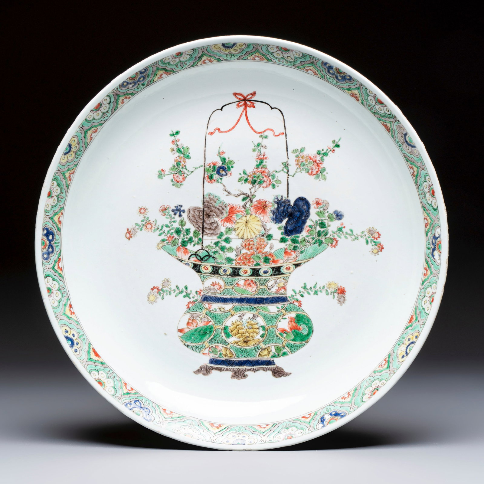 A Chinese famille verte 'Flower Basket' dish, lozenge mark, Kangxi: A Chinese famille verte 'Flower Basket' dish, lozenge mark, Kangxi Dia.: 38,7 cm