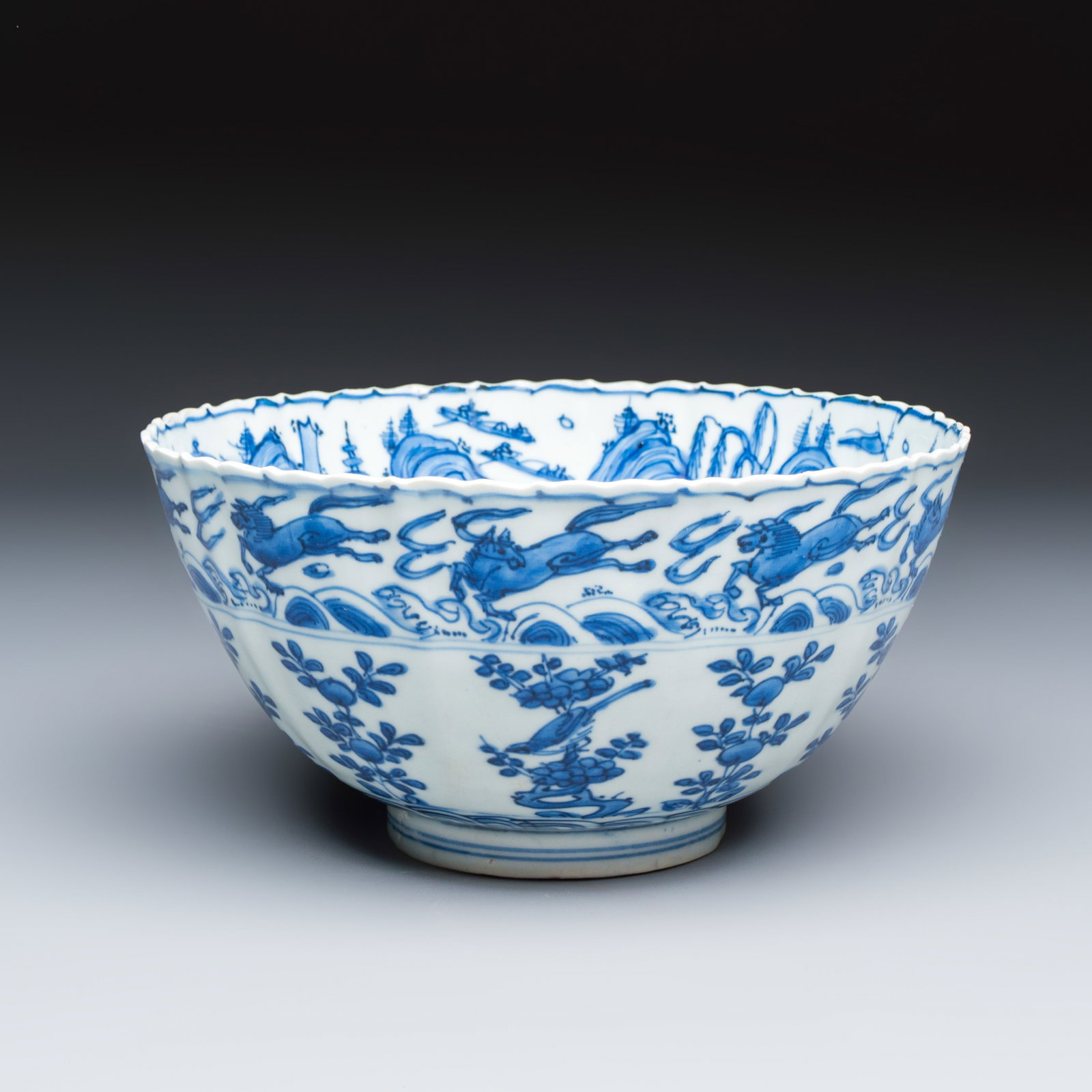 A Chinese blue and white 'Flying Horses and Landscapes' bowl, Wanli: A Chinese blue and white 'Flying Horses and Landscapes' bowl, Wanli Dia.: 21,2 cm - H.: 10,8 cm