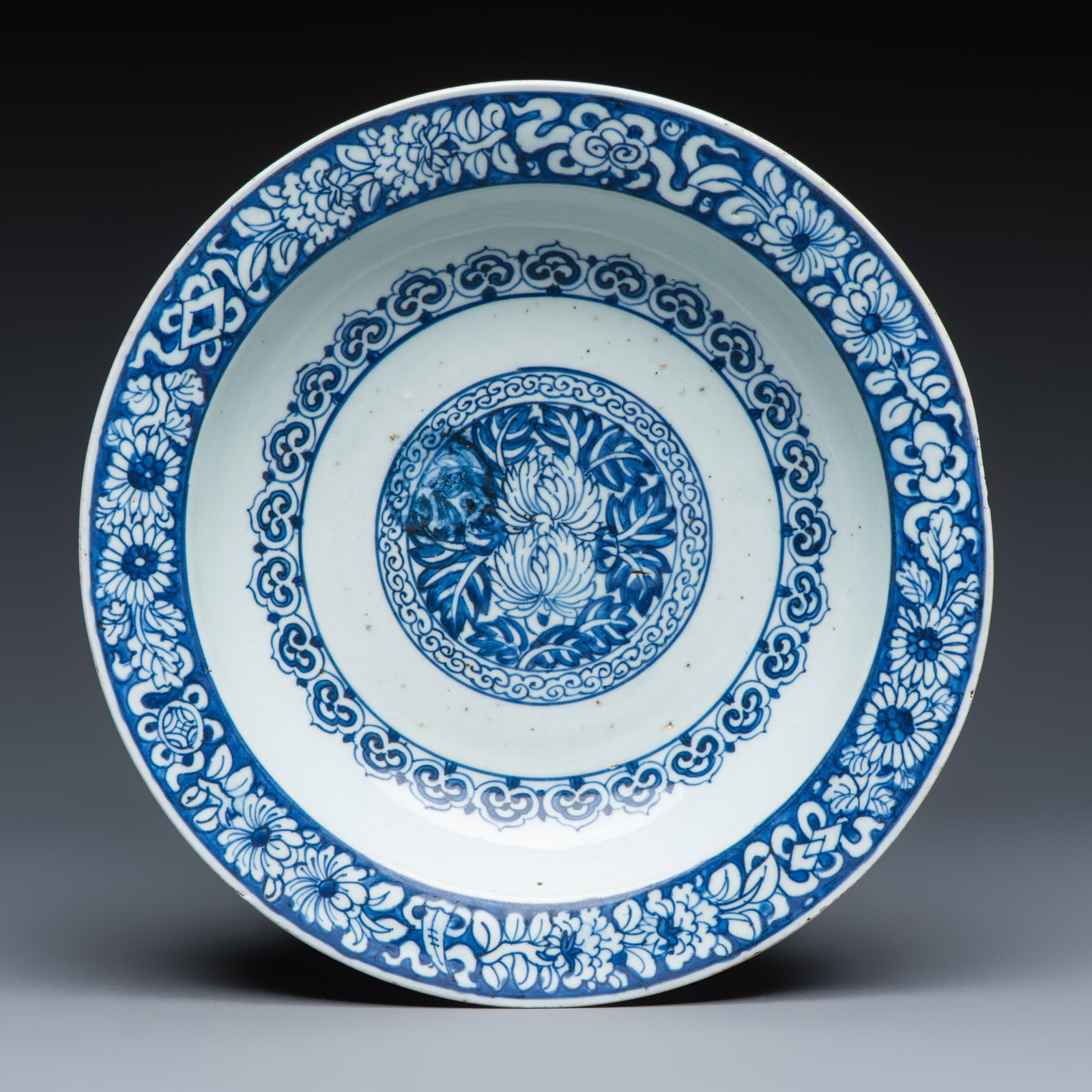 A Chinese blue and white dish with floral design, Wan Fu You Tong mark, Jiajing (1 of 2)