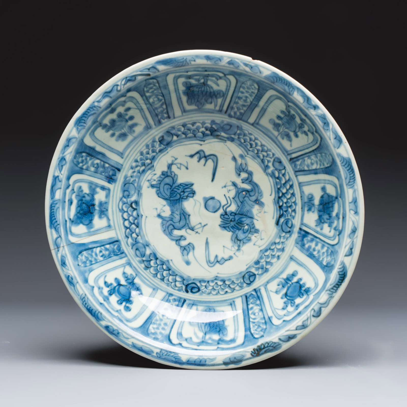 A Chinese Swatow blue and white 'Dragons' dish, Ming: A Chinese Swatow blue and white 'Dragons' dish, Ming Dia.: 39 cm