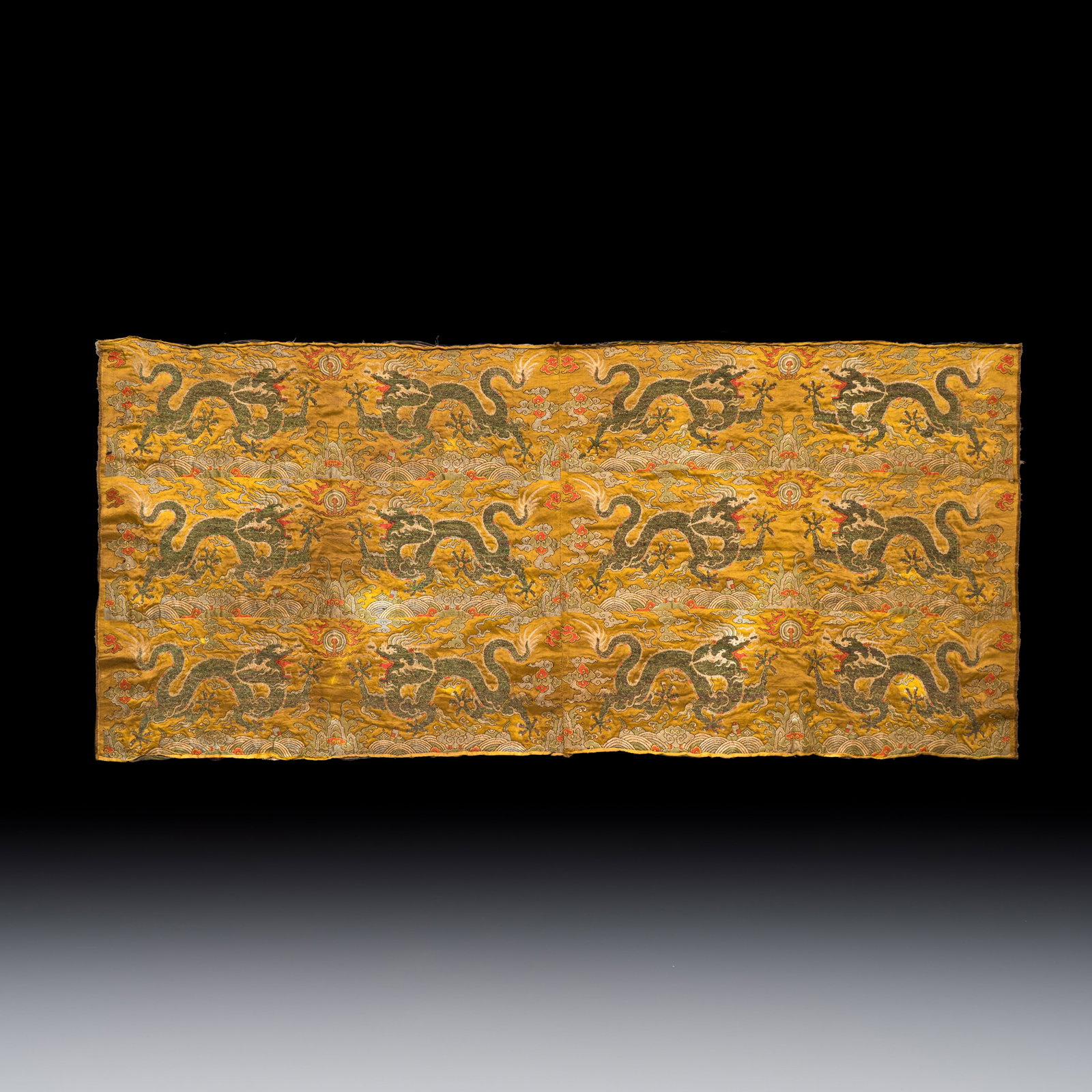 A rare Chinese peacock-feather brocade 'Dragons amid Clouds and Waves' panel, Ming (1 of 2)