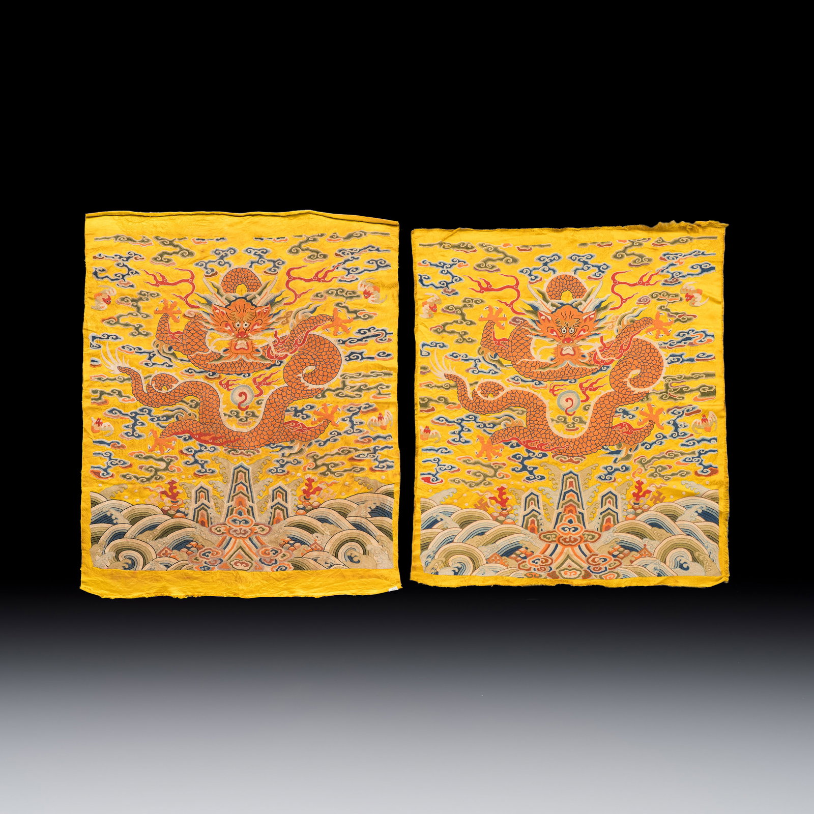 Two Chinese yellow-ground seed-stitch embroidered 'Dragon' panels, 19th C. (1 of 2)
