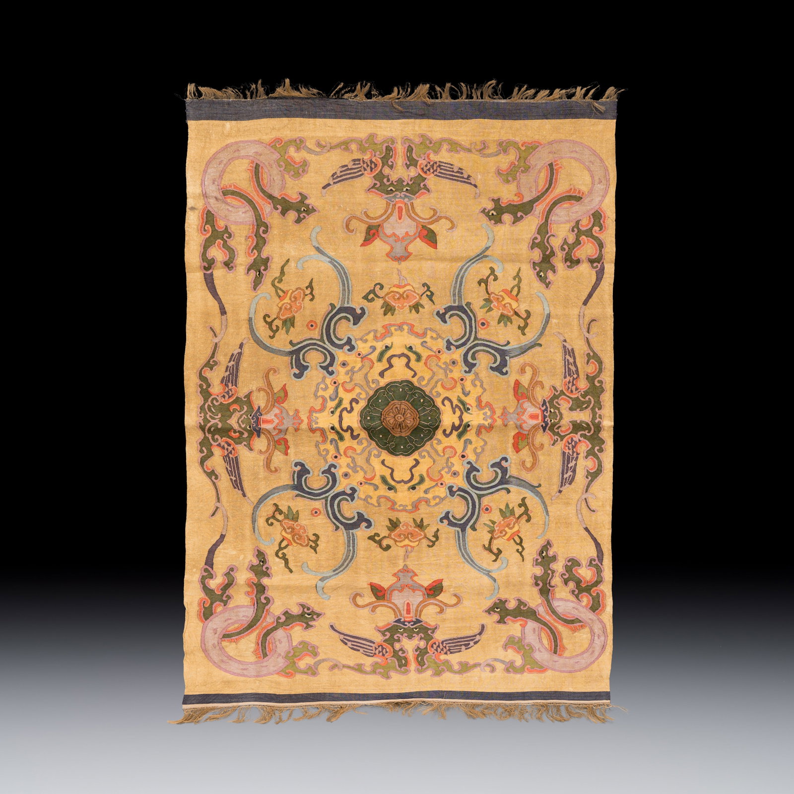 A Chinese kesi panel with floral design, 19/20th C. (1 of 2)
