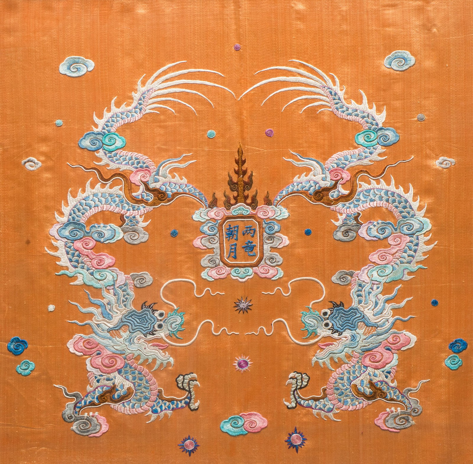A Japanese embroidered silk 'Dragons' panel, 19th C. (1 of 3)