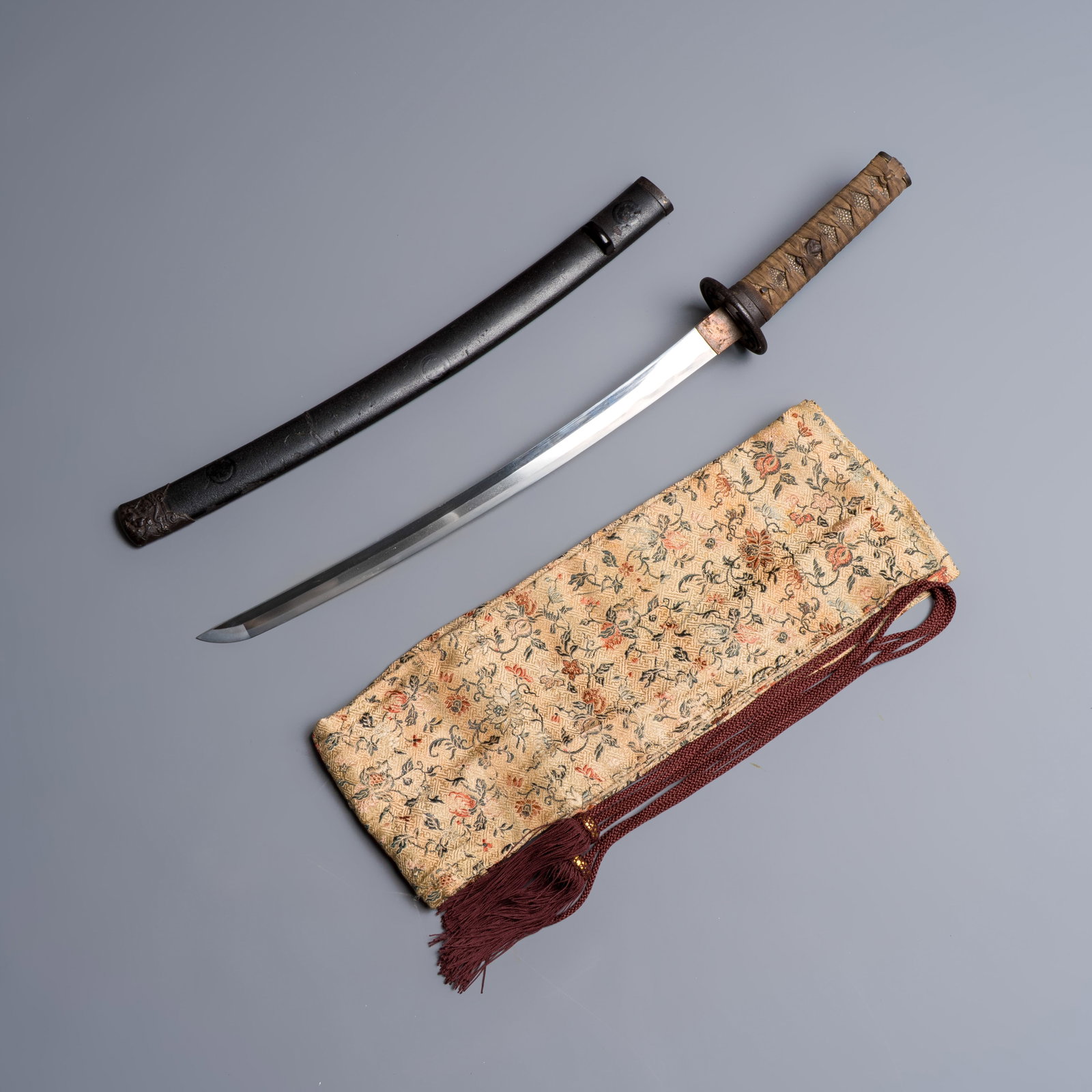 A Japanese wakizashi, signed Izumi no Kami Kanesada, with koshirae, Edo, 18/19th C. (1 of 16)