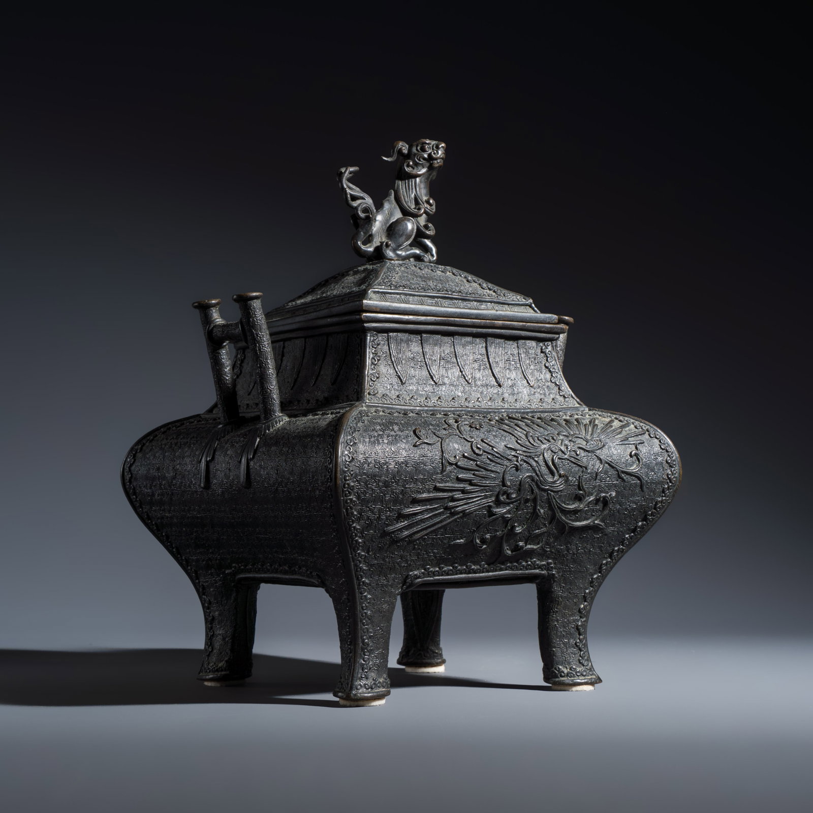 A Japanese bronze 'Phoenix' square incense burner and cover with shishi finial, Eisei mark, Meiji, (1 of 7)