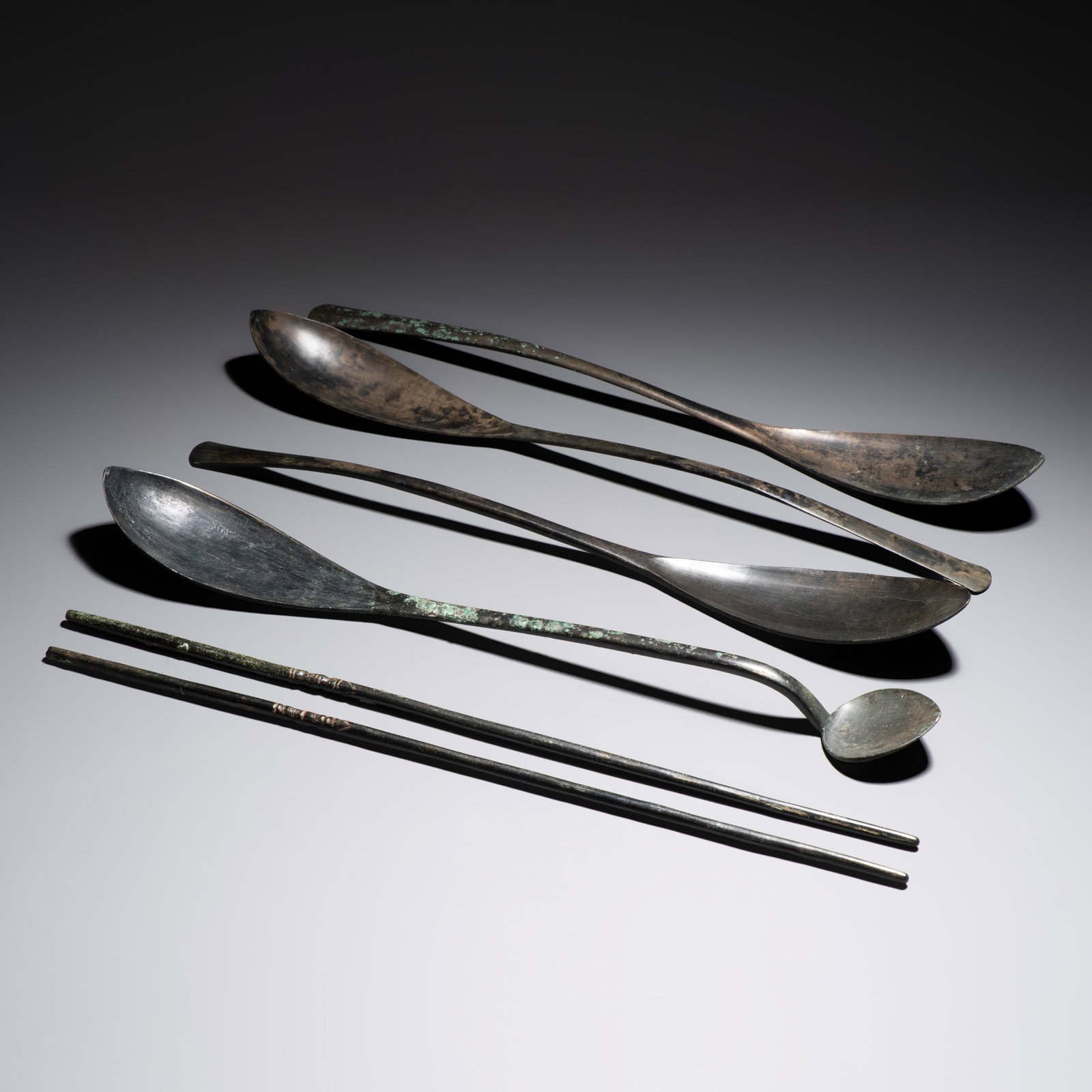 Four Korean or Chinese bronze spoons and a pair of chopsticks, Goryeo/Liao (1 of 5)