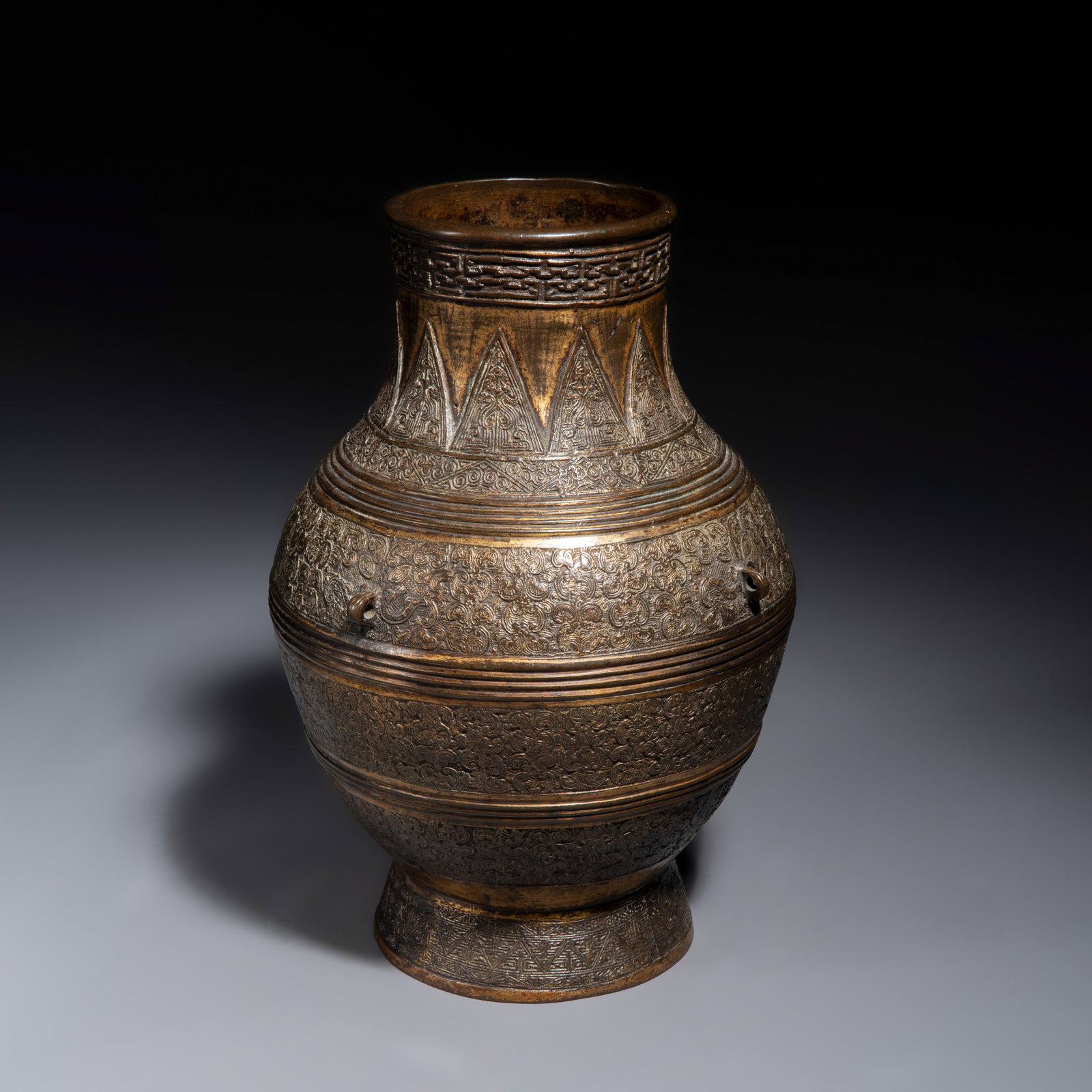 A Chinese archaistic parcel-gilt bronze vase with bats design, 17/18th C. (1 of 7)