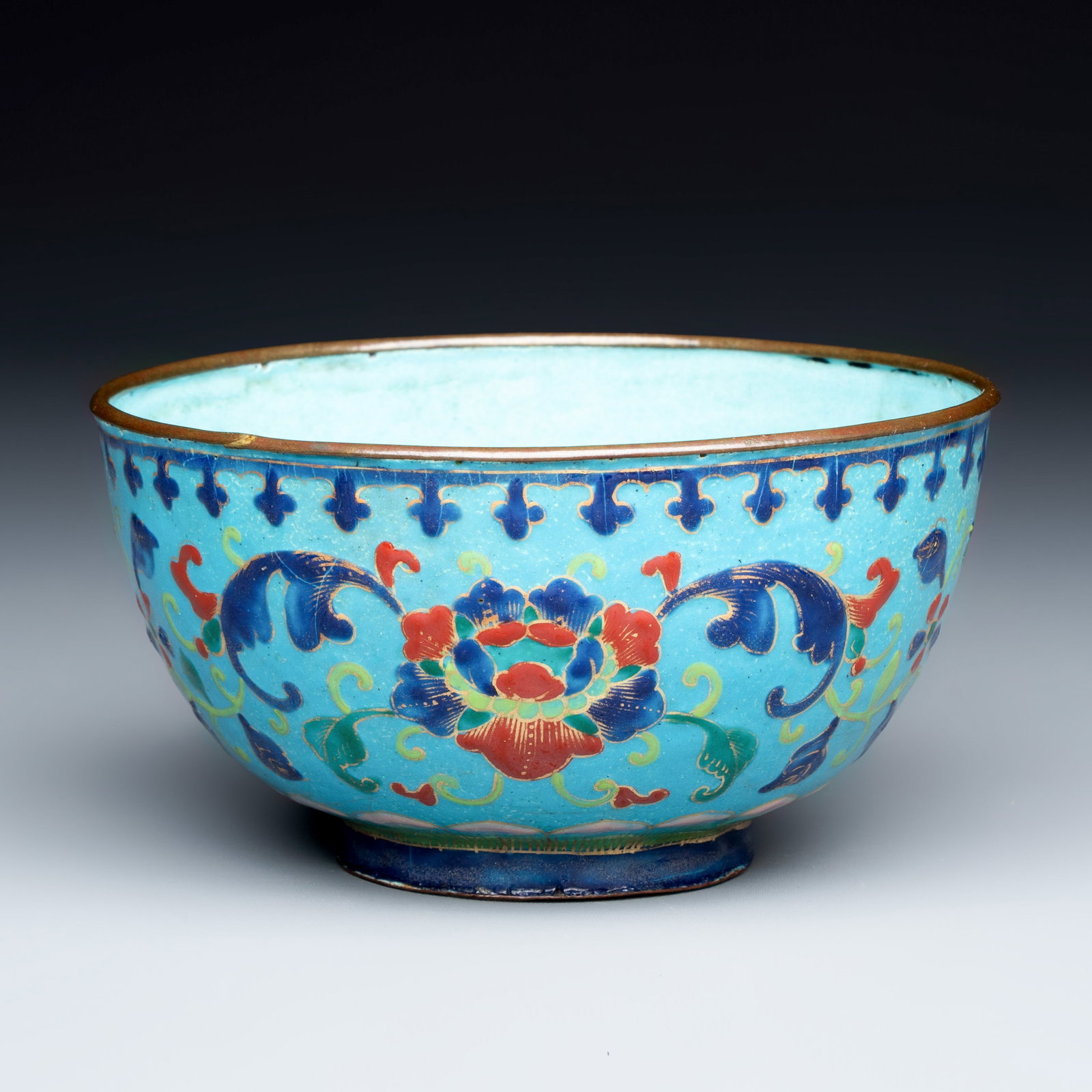 A Chinese Canton enamel 'Lotus Scroll' bowl, Qianlong/Jiaqing (1 of 7)