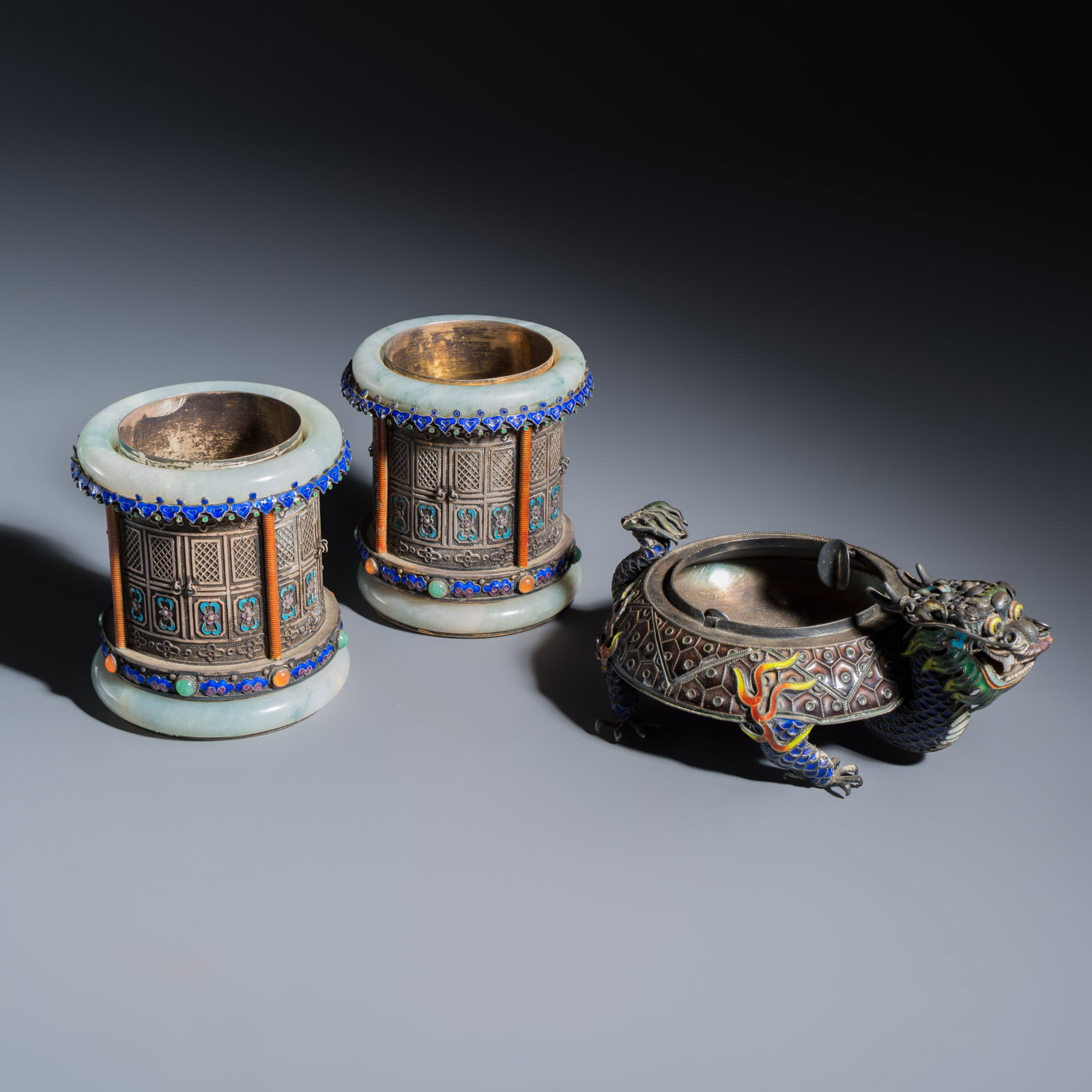 A pair of Chinese jade-mounted enamelled silver vessels and a zoomorphic ashtray, 20th C. (1 of 15)