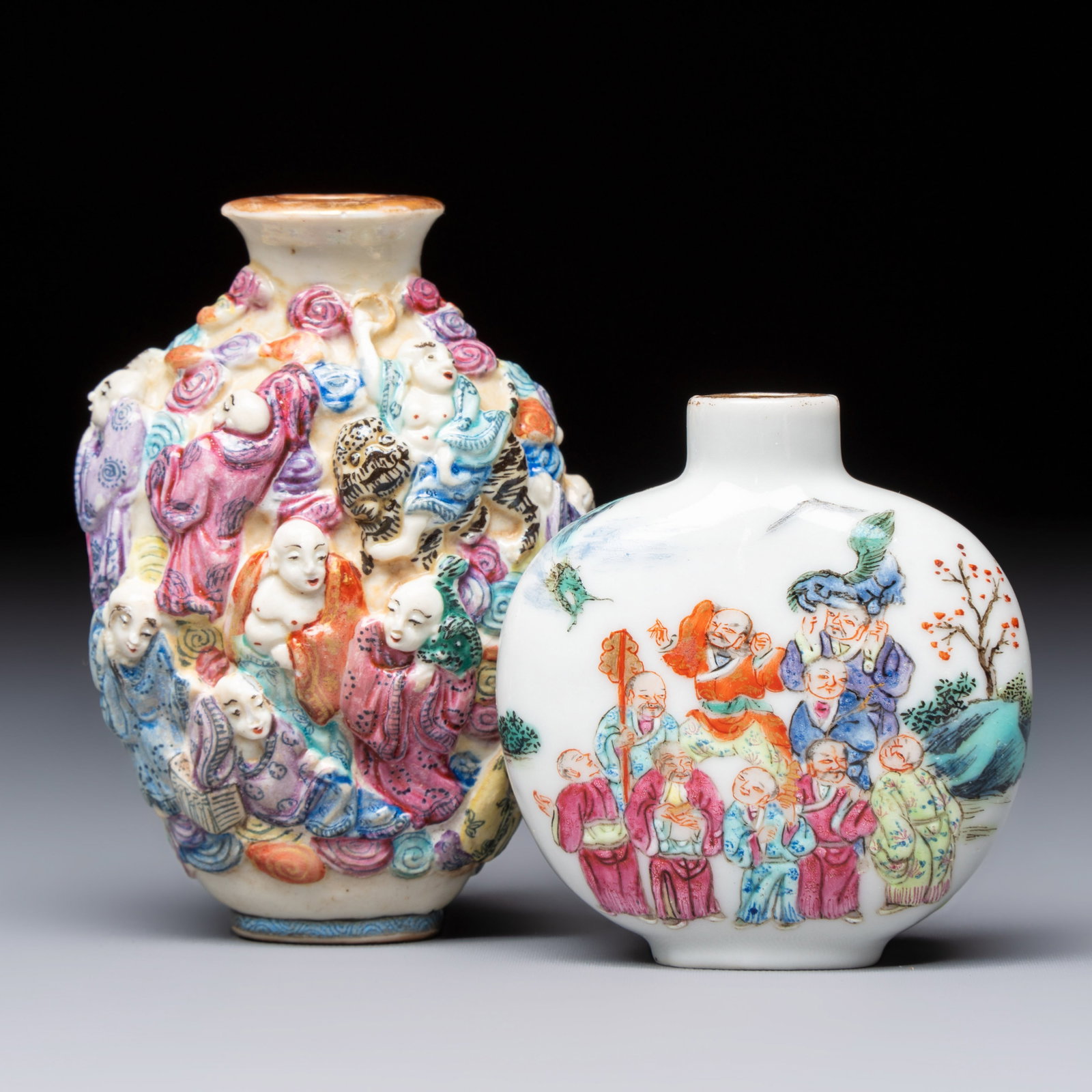 Two Chinese famille rose '18 Luohan' snuff bottles, Qianlong and Daoguang marks, 19th C. (1 of 7)