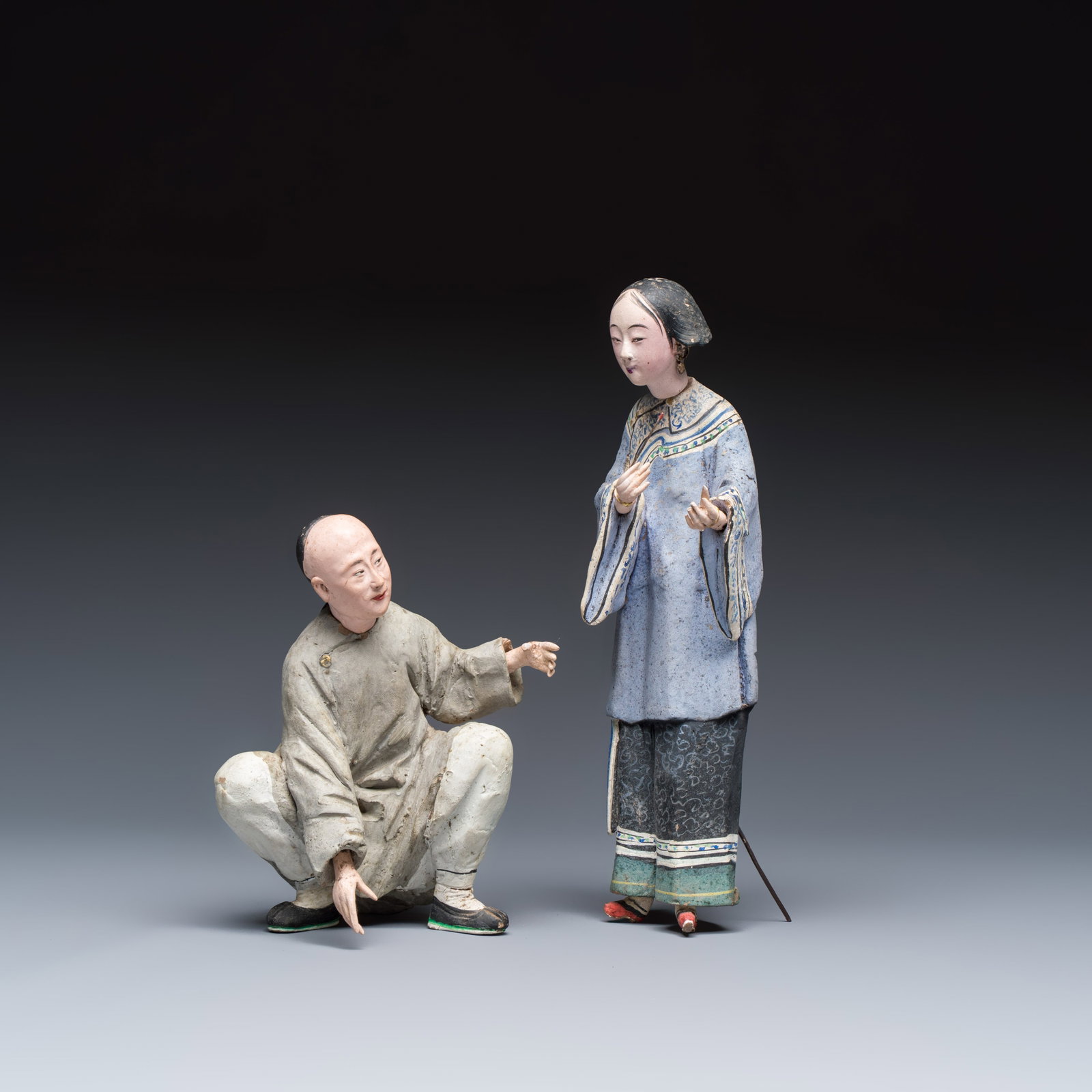 A pair of Chinese export painted unfired clay figures, Qing (1 of 7)