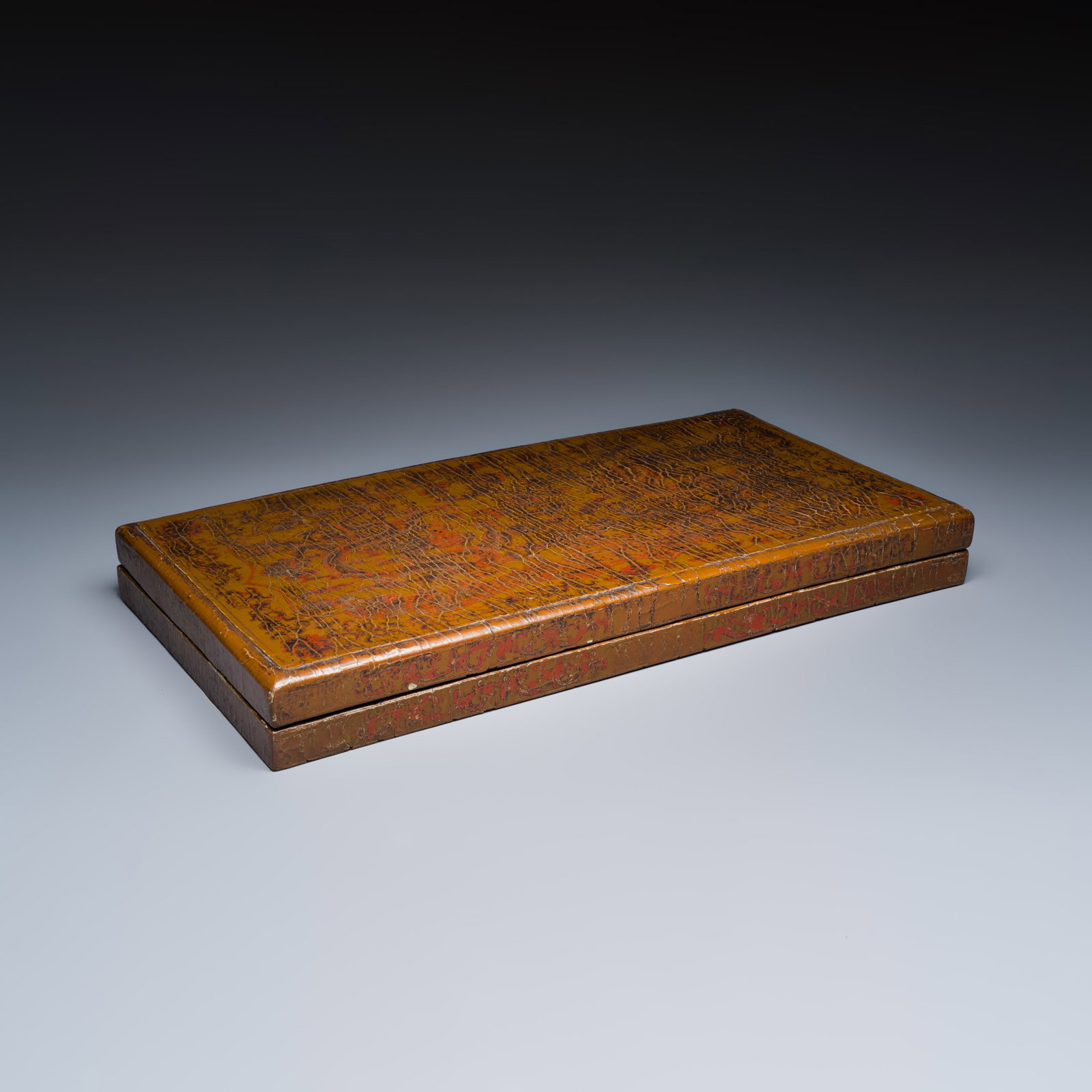A rare Chinese polychrome and gilt-decorated lacquer rectangular box and cover with dragons, Ming (1 of 10)