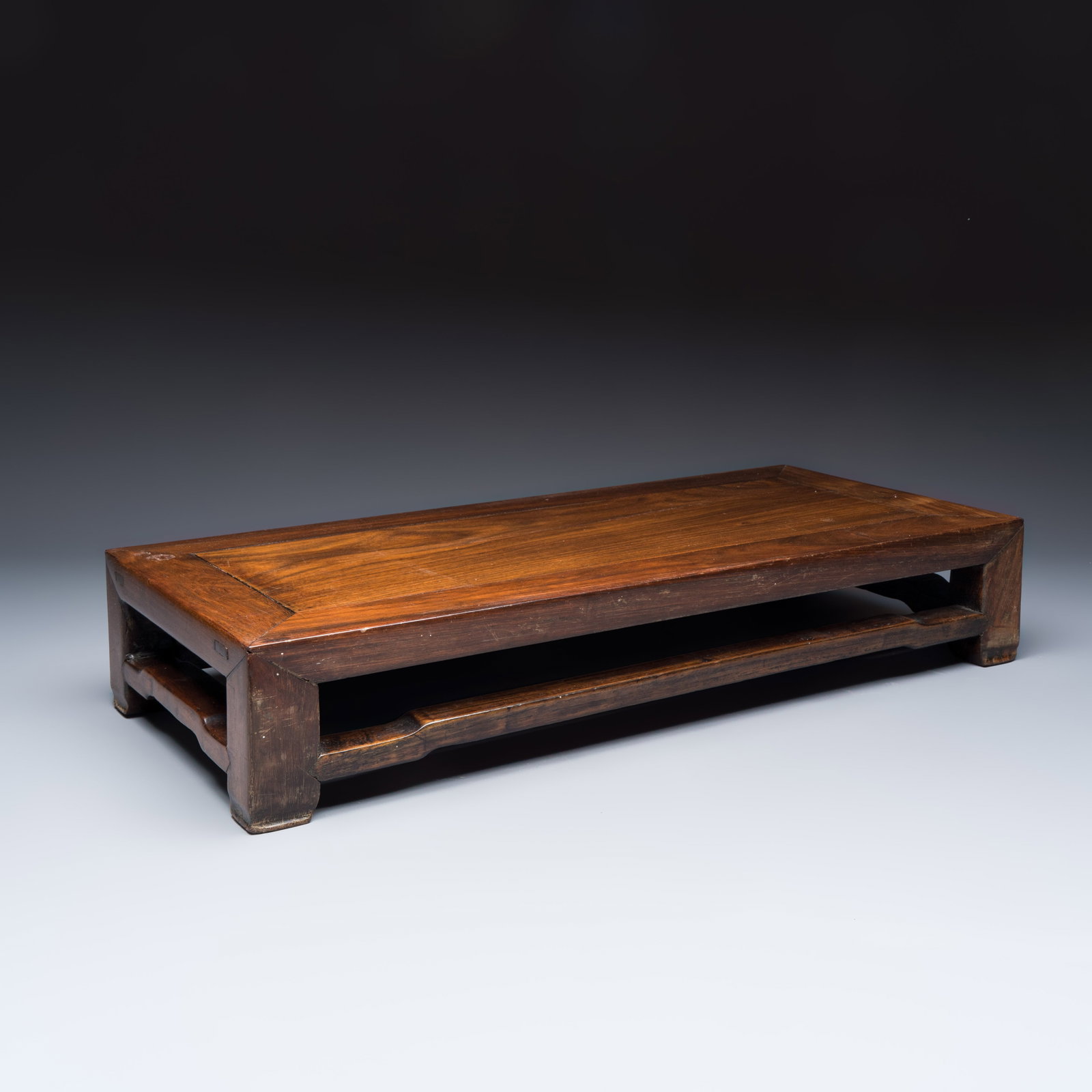 A Chinese rectangular hongmu stand, 19th C. (1 of 8)