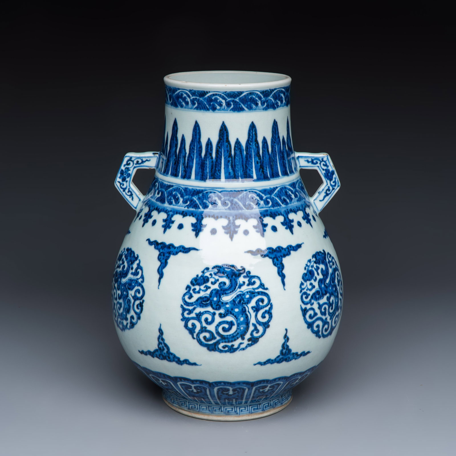 A Chinese blue and white 'Hu' vase with phoenix medallions, Qianlong (1 of 7)