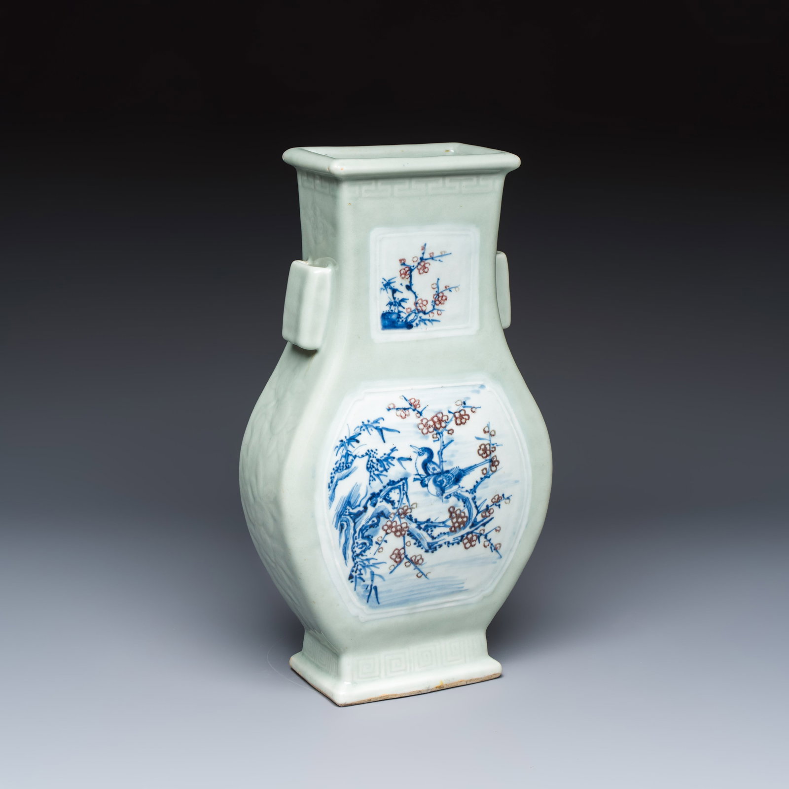 A Chinese blue, white and copper-red celadon-ground 'Hu' vase with birds among blossoming branches, (1 of 7)