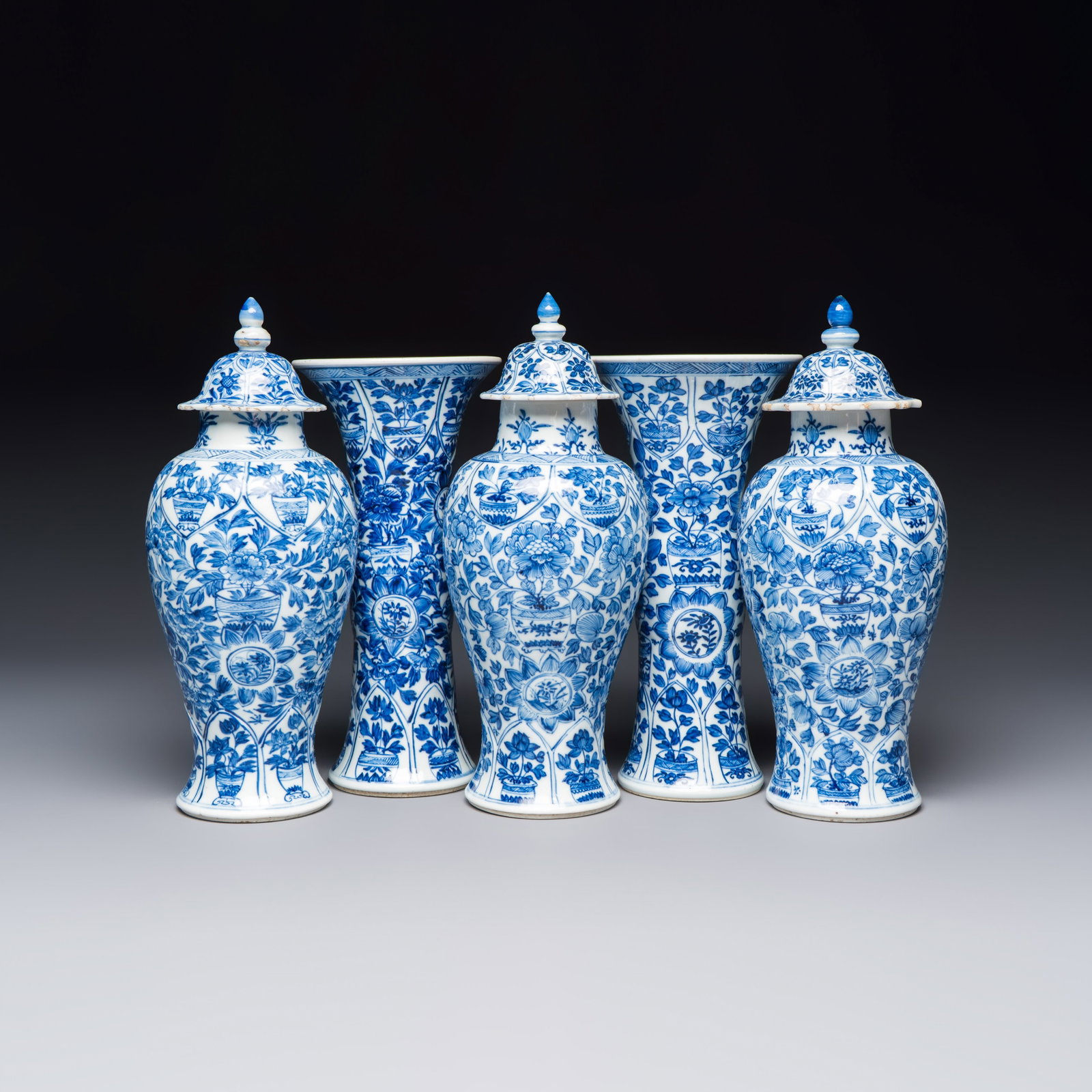 A Chinese blue and white five-piece garniture with floral design, Kangxi (1 of 13)