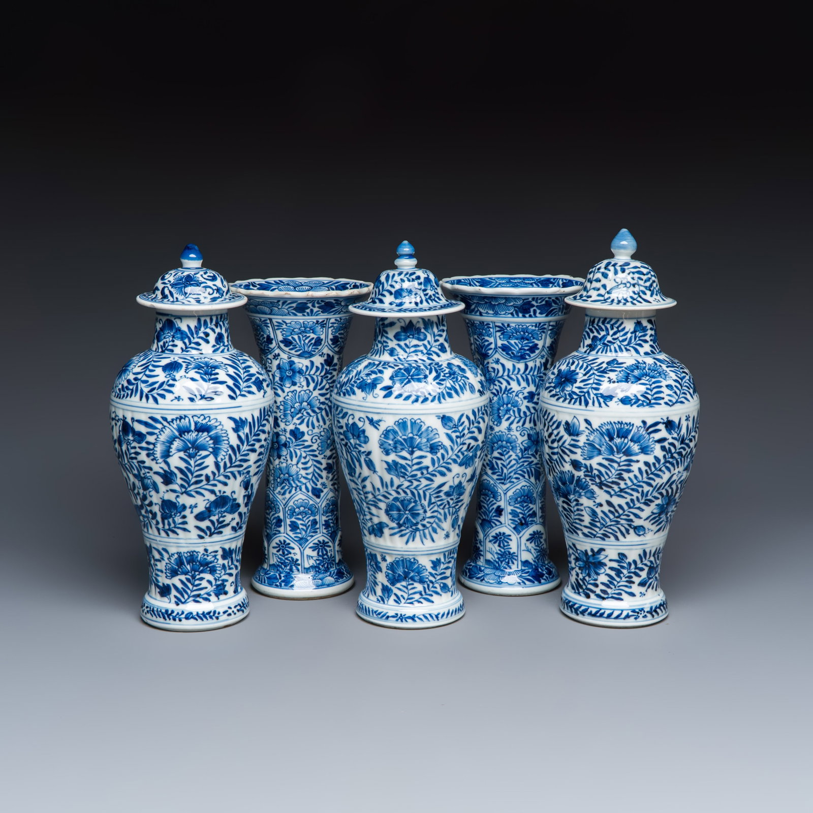 A Chinese blue and white five-piece garniture with floral design, Kangxi (1 of 13)