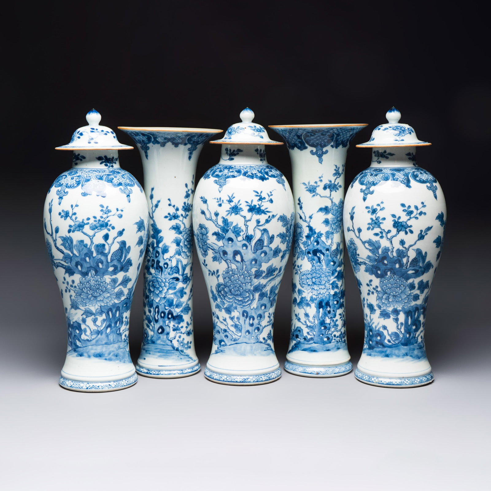 A Chinese blue and white five-piece garniture with birds among flowering branches, Qianlong (1 of 13)