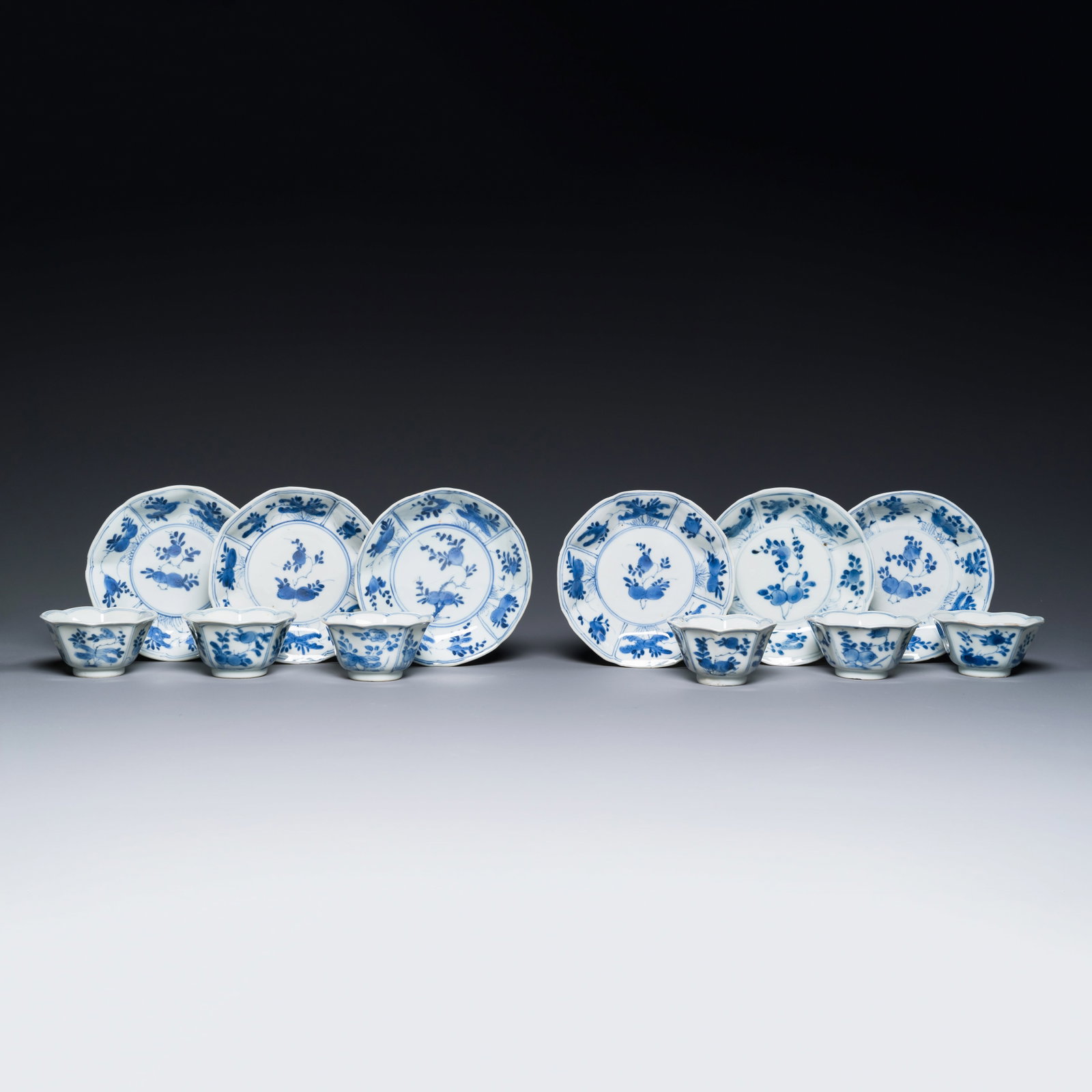 A set of six Chinese blue and white flower-shaped 'Sanduo' tea bowls and saucers, lingzhi mark,: A set of six Chinese blue and white flower-shaped 'Sanduo' tea bowls and saucers, lingzhi mark, Kangxi Dia.: 11 cm | the saucers Dia.: 6,5 cm - H.: 3,5 cm | the tea bowls