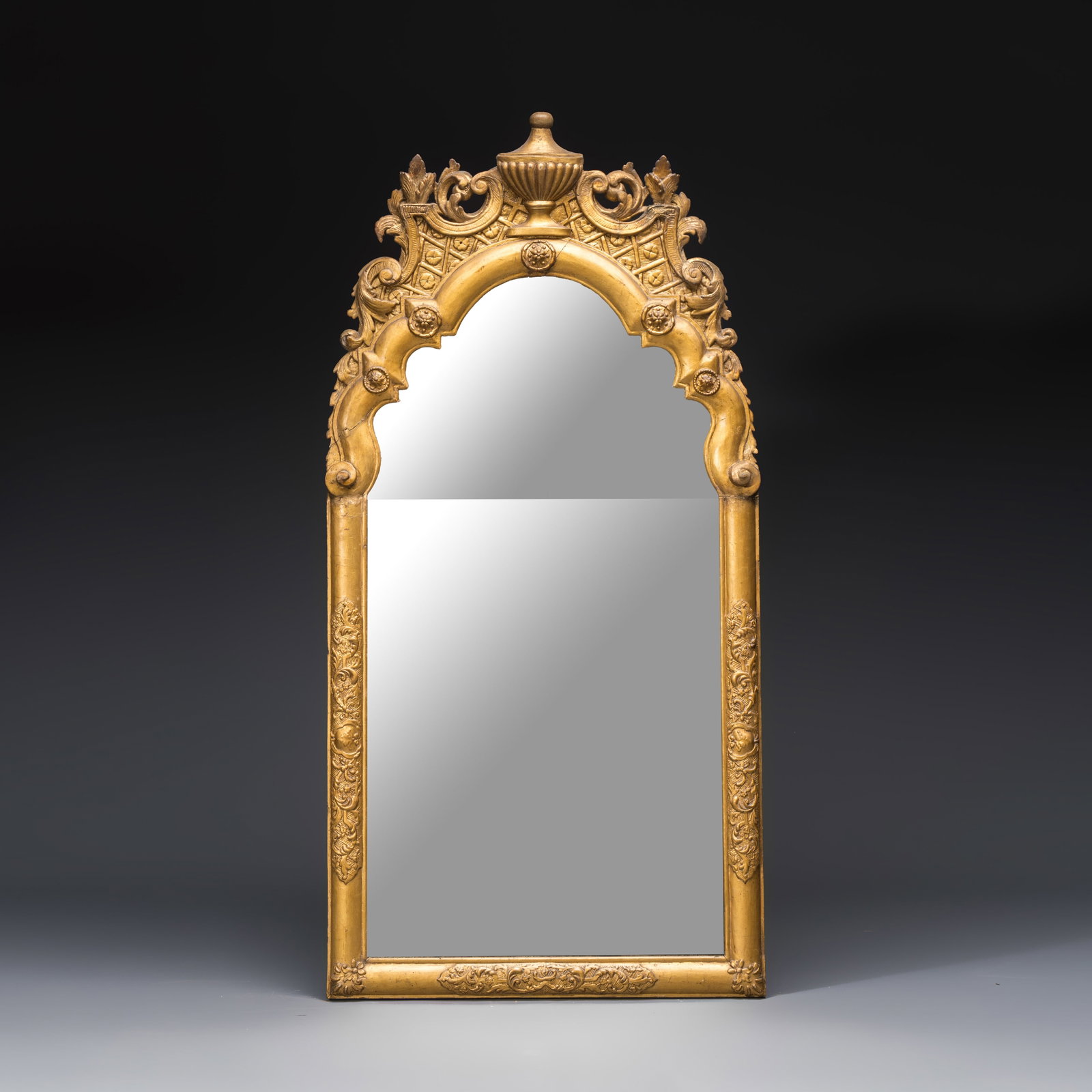 A French Louis XIV gilt-wood mirror, early 18th C. (1 of 2)