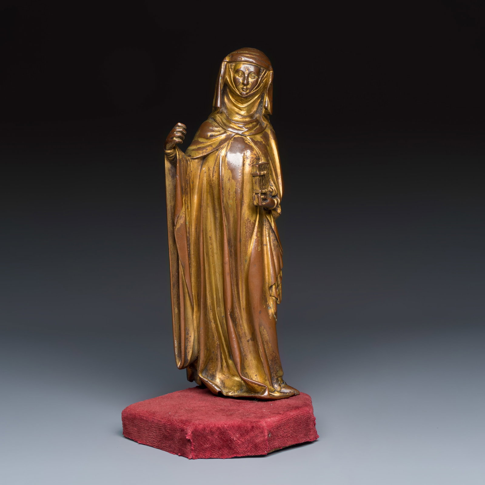 A French gilt-bronze figure of a female saint, 19th C. (1 of 9)