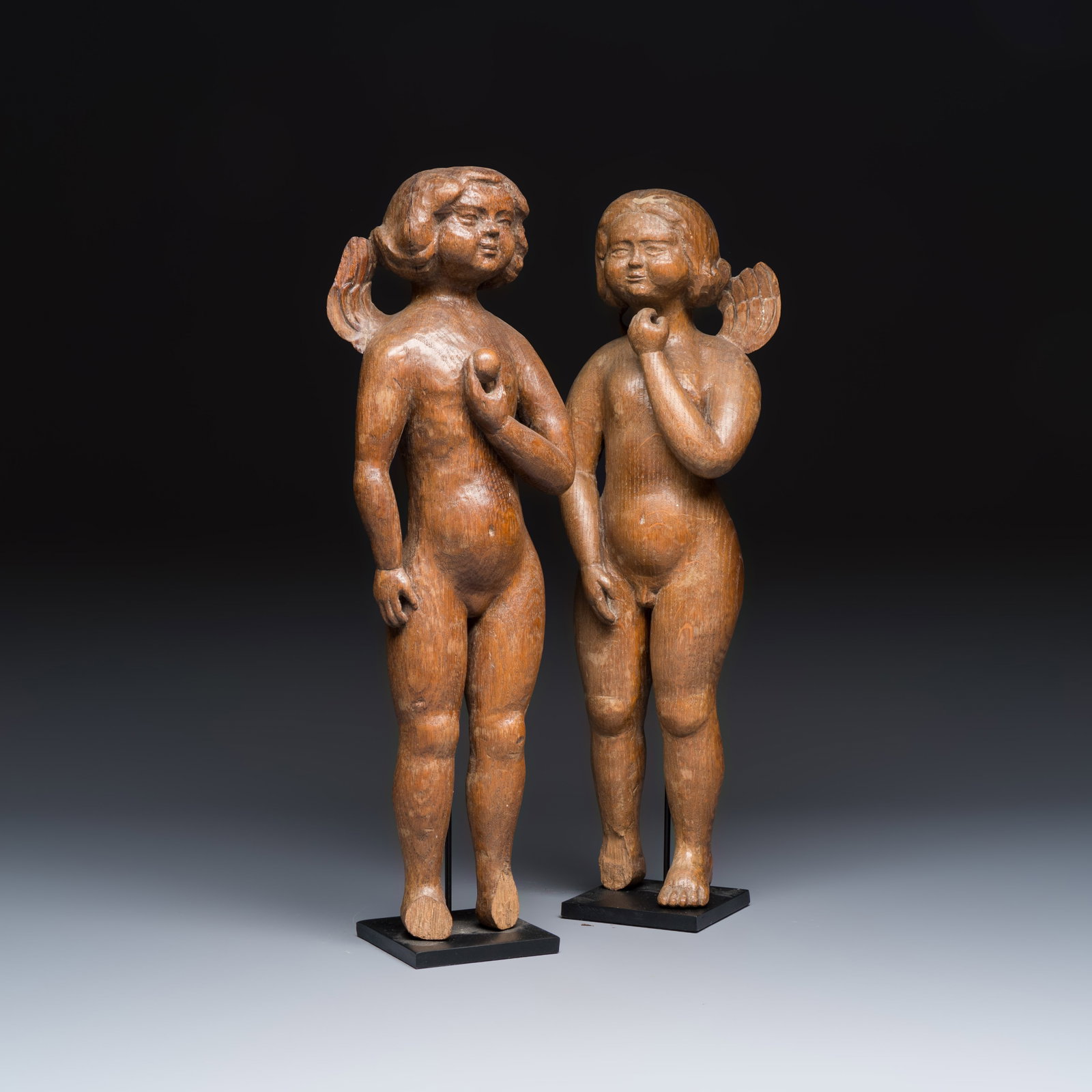 A pair of carved wooden figures of winged angels, probably 17th C. (1 of 7)