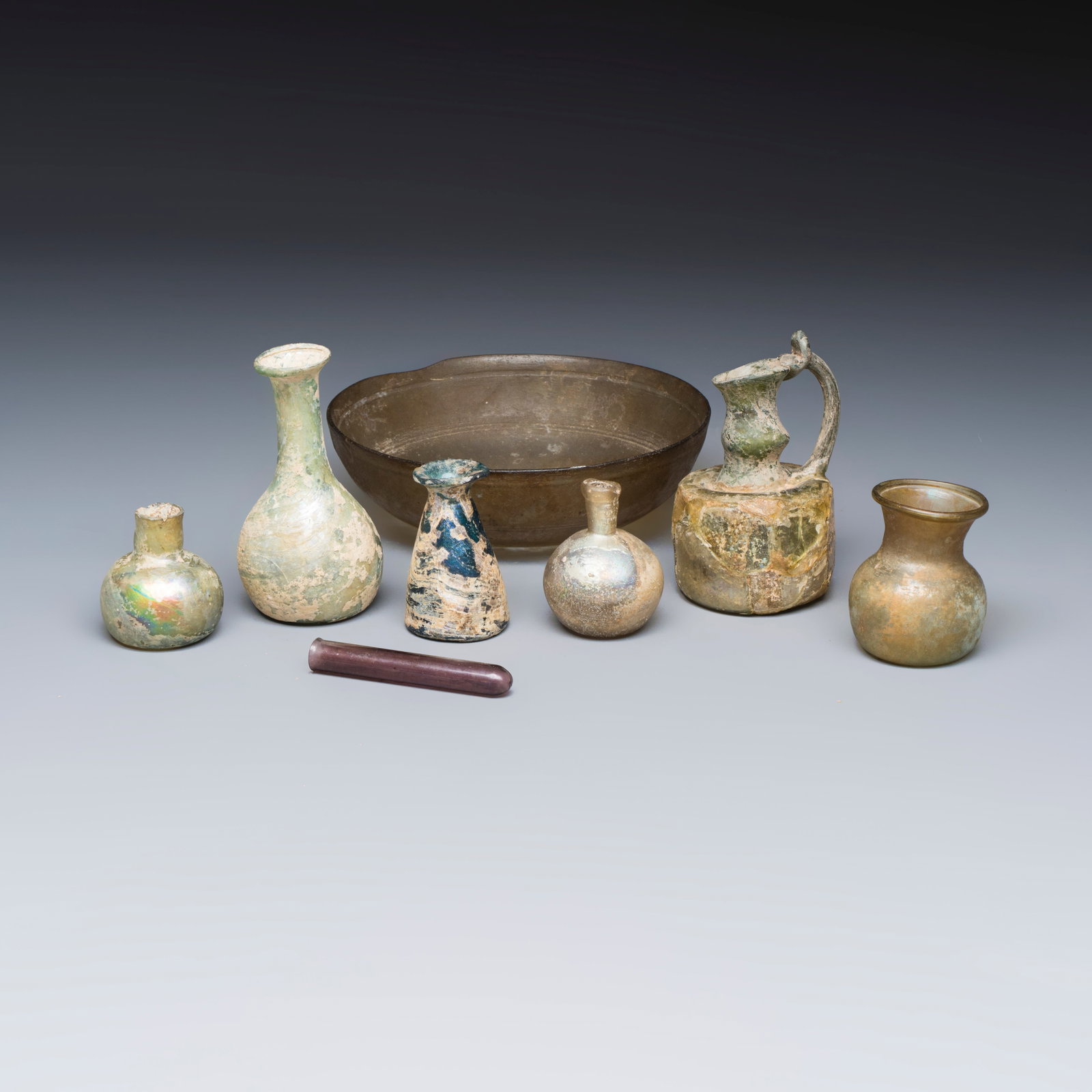 A varied collection of eight Roman glass wares, 1st C. B.C./4th C. and later (1 of 15)