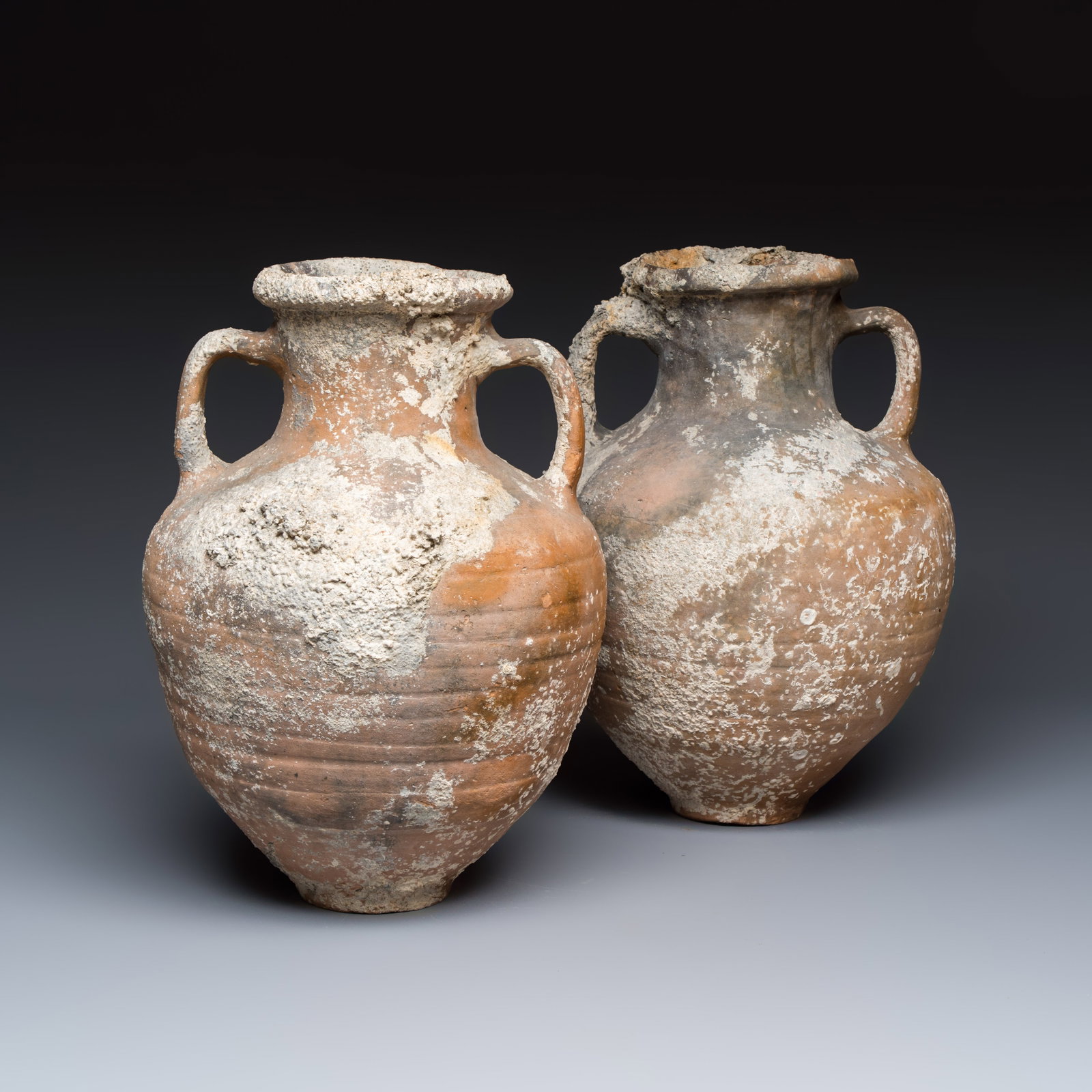 A pair of Roman pottery two-handled cooking vessels, 2nd/1st C. B.C. (1 of 7)