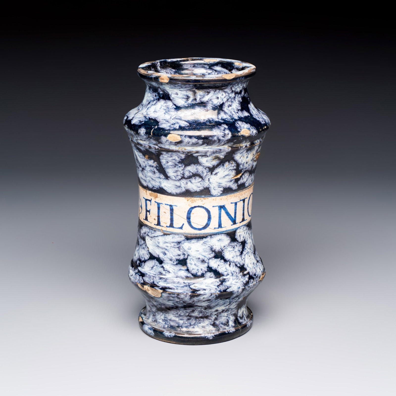 A white-splashed blue-ground Italian maiolica albarello, 2nd half 16th C.: A white-splashed blue-ground Italian maiolica albarello, 2nd half 16th C. H.: 22 cm