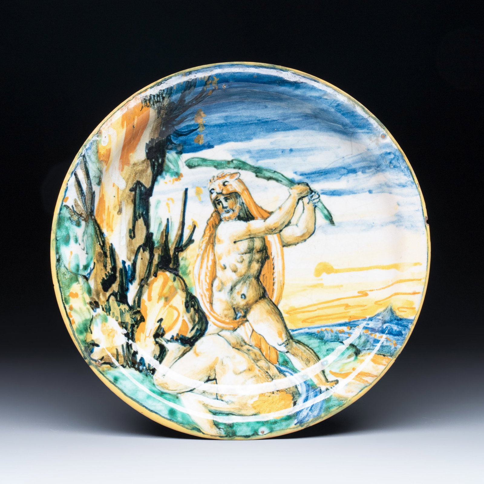 A mythological Italian maiolica istoriato plate with 'Hercules and Lichas', Urbino, 2nd half 16th C.: A mythological Italian maiolica istoriato plate with 'Hercules and Lichas', Urbino, 2nd half 16th C. Dia.: 22,2 cm