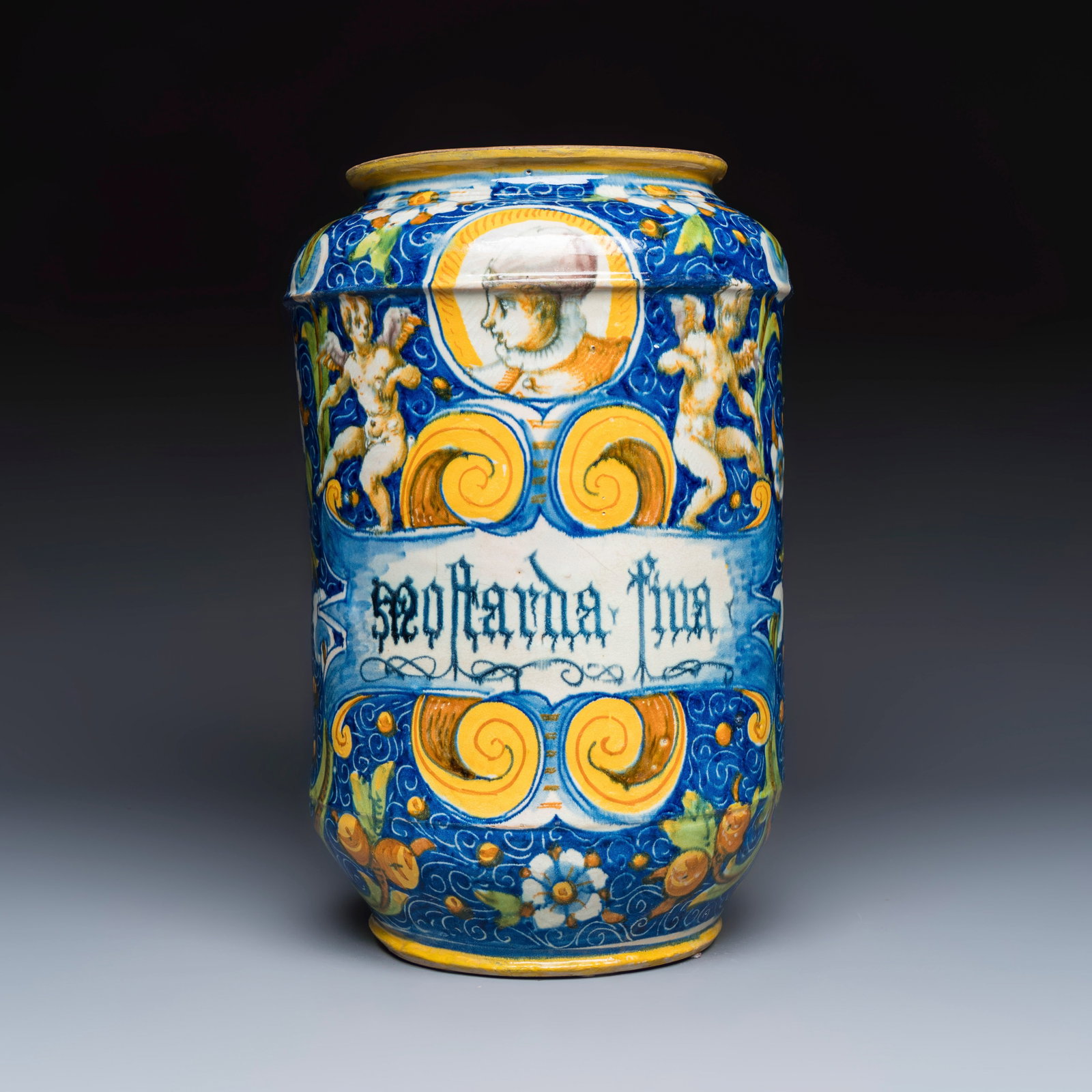 A large polychrome Italian maiolica albarello inscribed 'Mostarda Fina', workshop of Maestro (1 of 6)