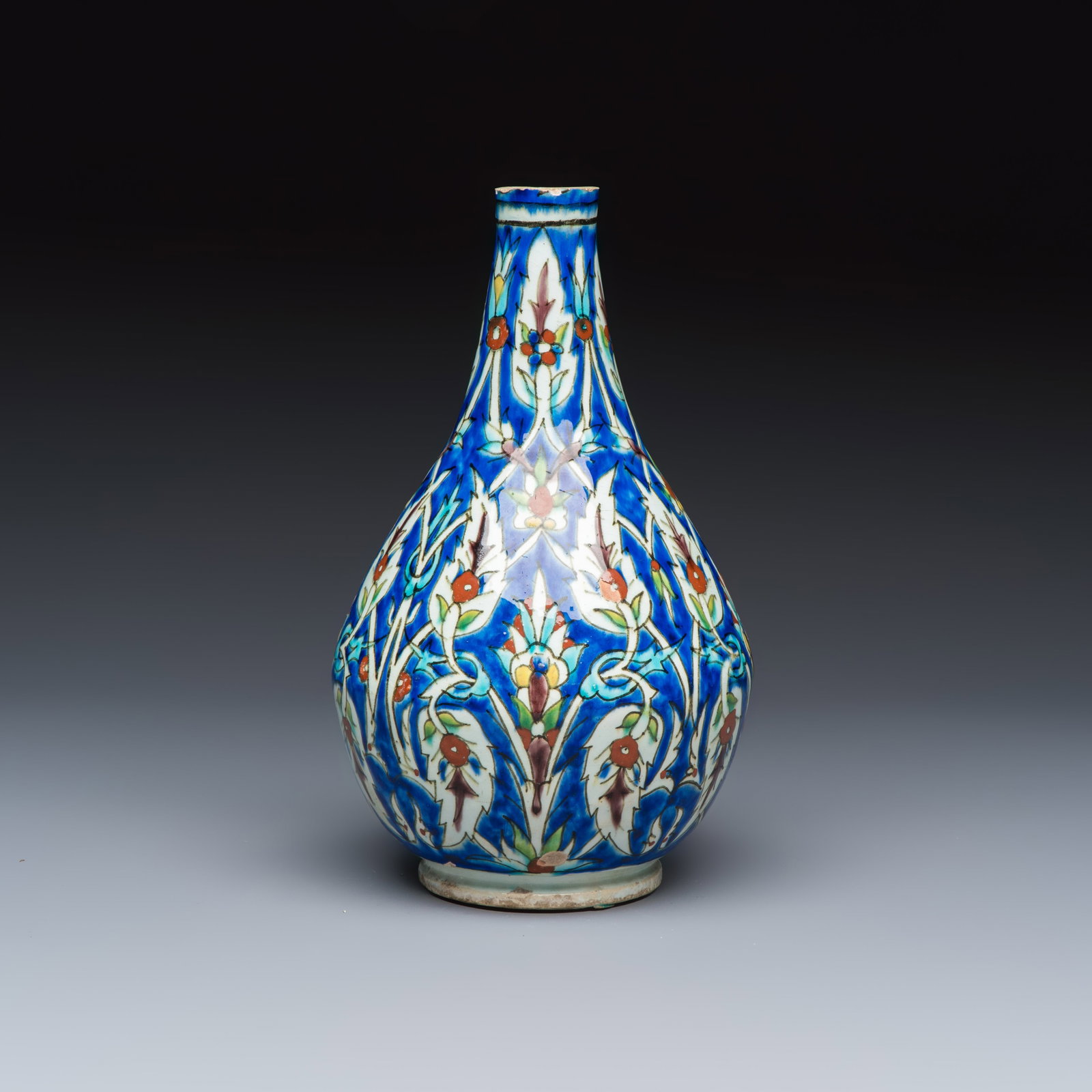 A Kutahya Iznik-style bottle vase with saz leaves, Turkey, 19th C. (1 of 6)