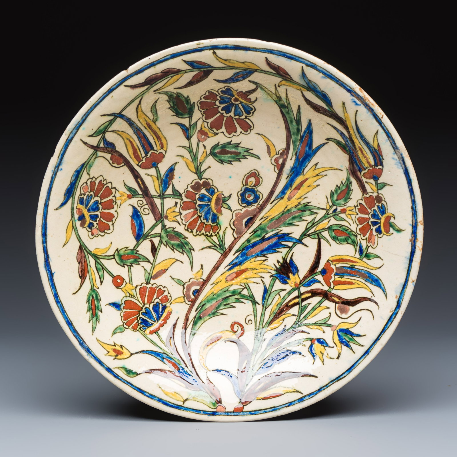 A polychrome Kutahya pottery Iznik-style dish, 19th C. (1 of 2)