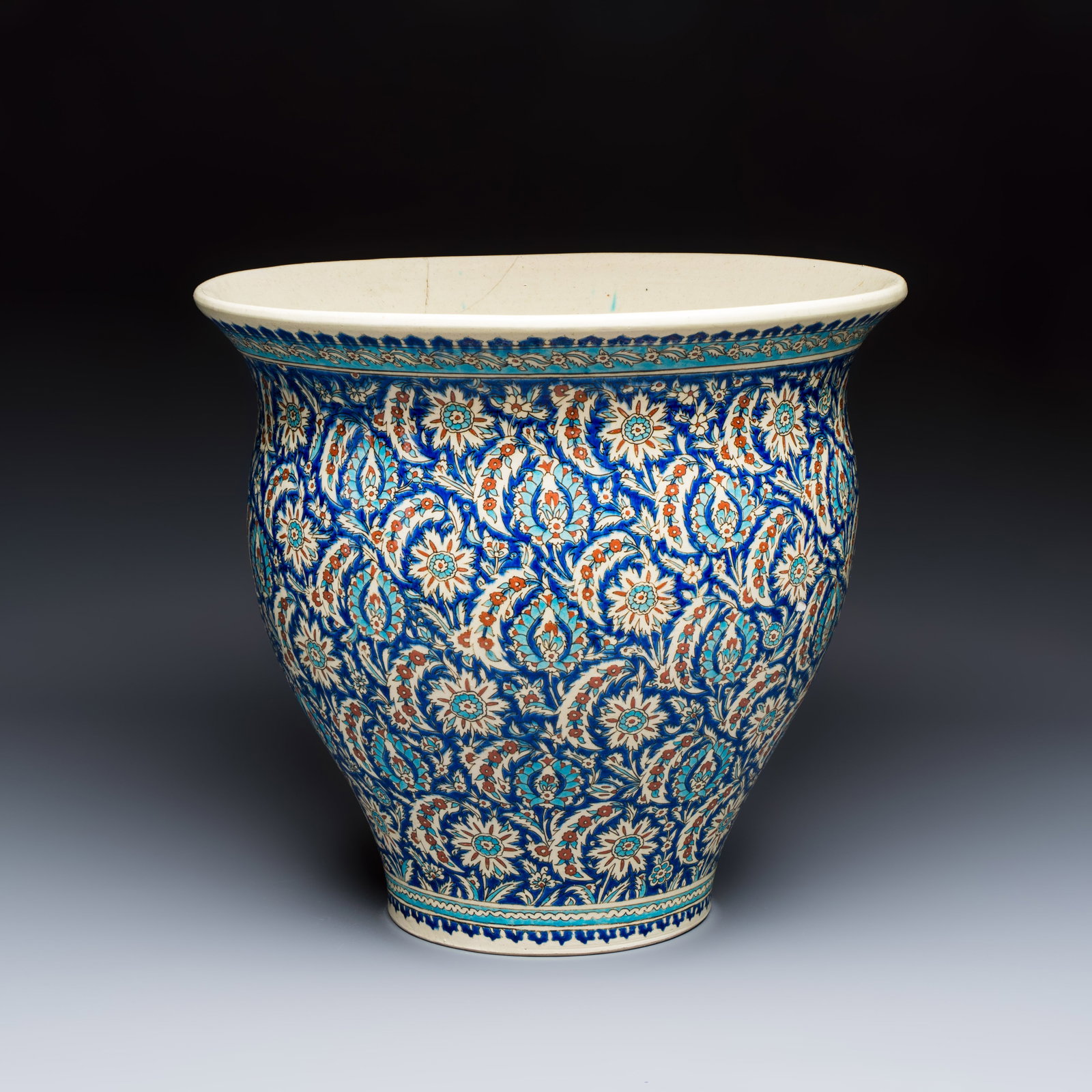 A large Kutahya blue-ground Iznik-style jardiniere, Turkey, 19th C.: A large Kutahya blue-ground Iznik-style jardiniere, Turkey, 19th C. Dia.: 42 cm - H.: 38,3 cm