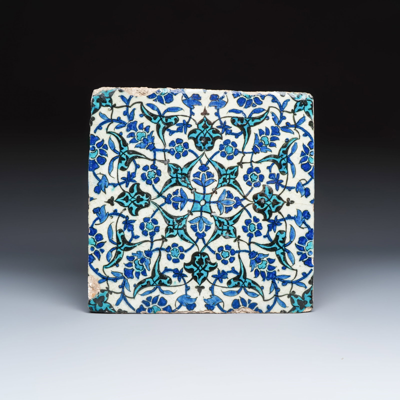 A large polychrome Damascus pottery tile with ornamental floral design, early 17th C. (1 of 2)